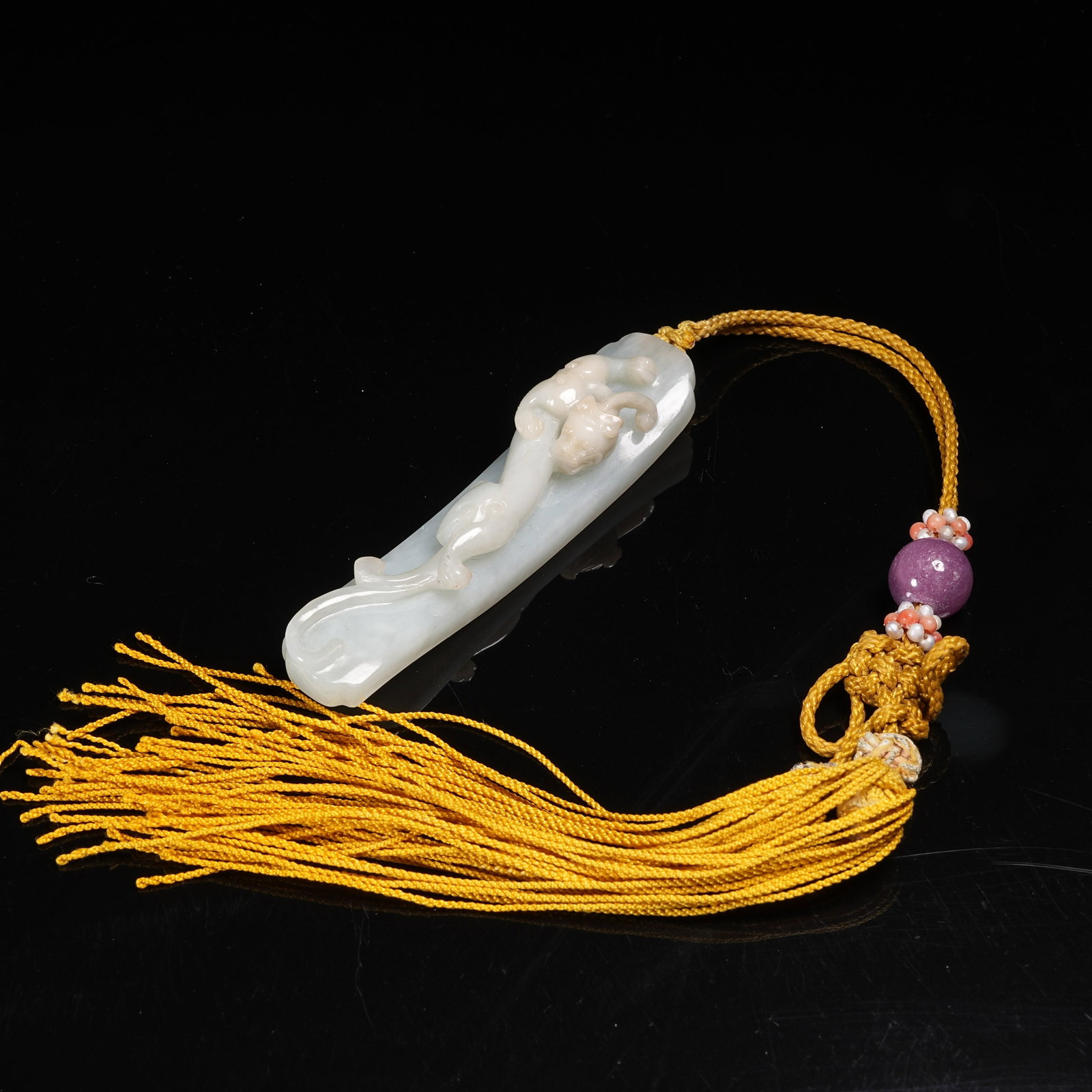 A JADEITE PENDANT WITH CHI-DRAGON MOTIF (1 of 8)