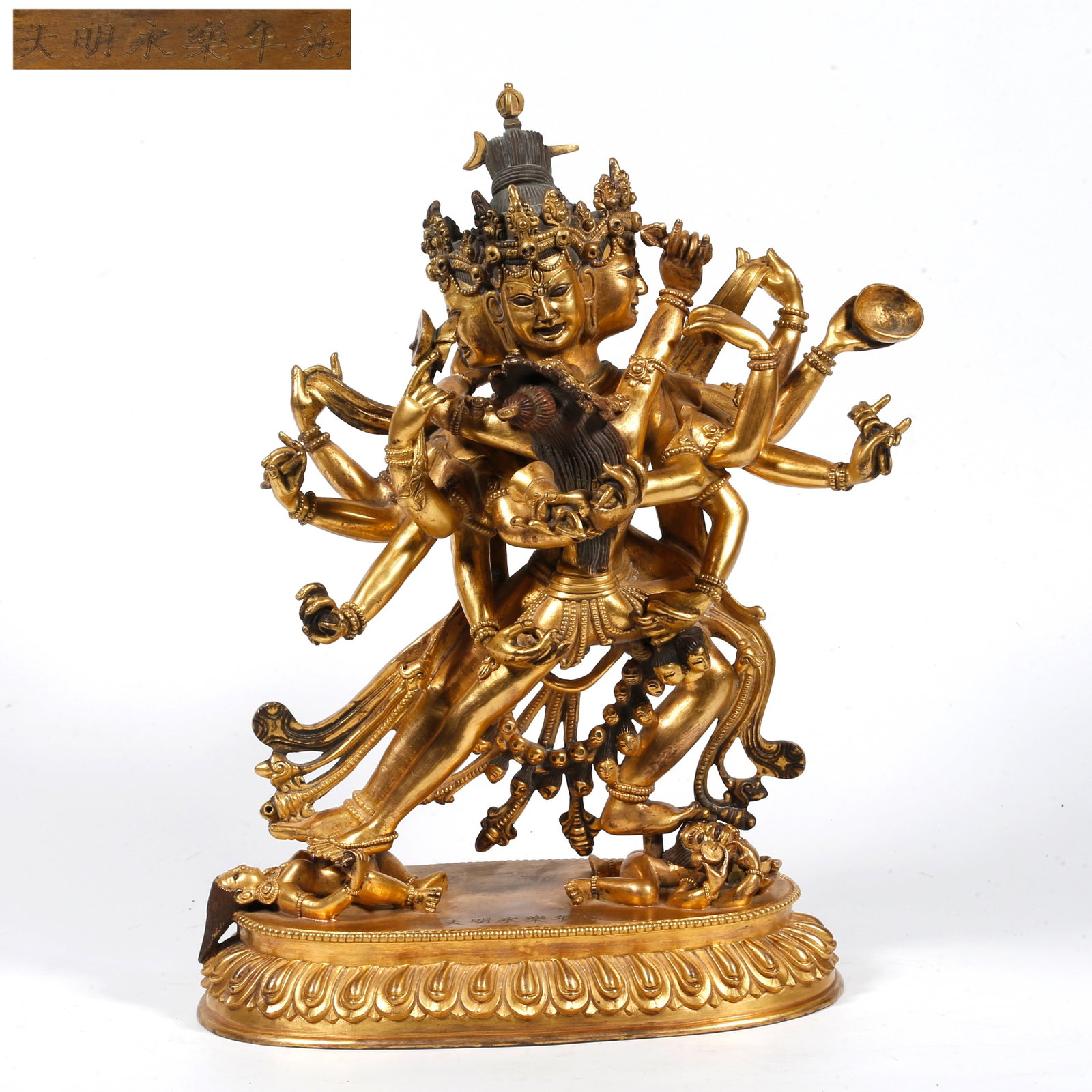 A GILT-BRONZE BUDDHA STATUE (1 of 10)