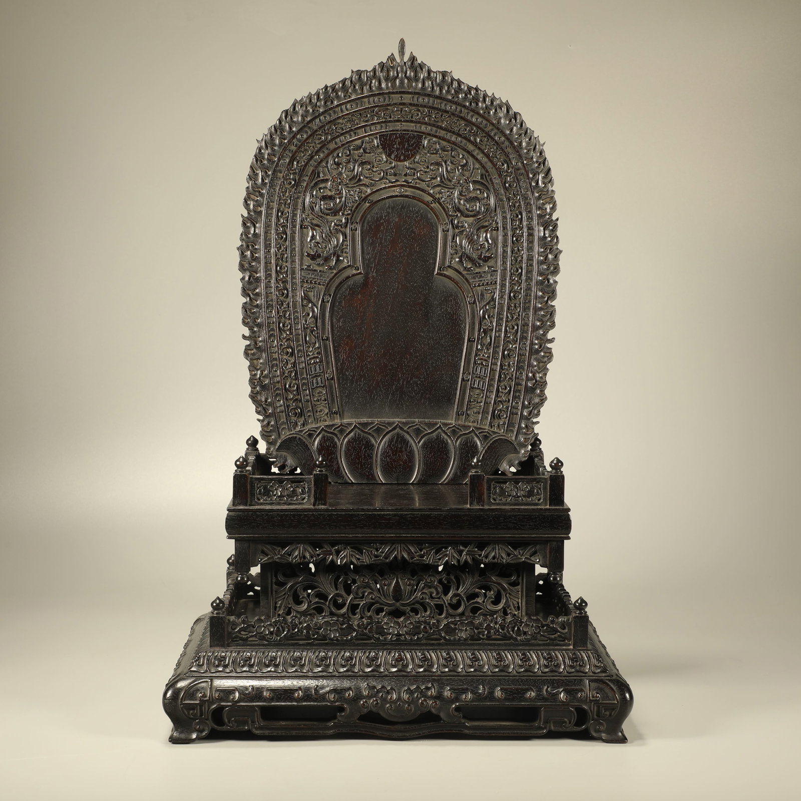 A RED SANDALWOOD BUDDHIST NICHE CARVED WITH FLORAL PATTERN: Red Sandalwood Buddhist Niche Carved with Floral Pattern
