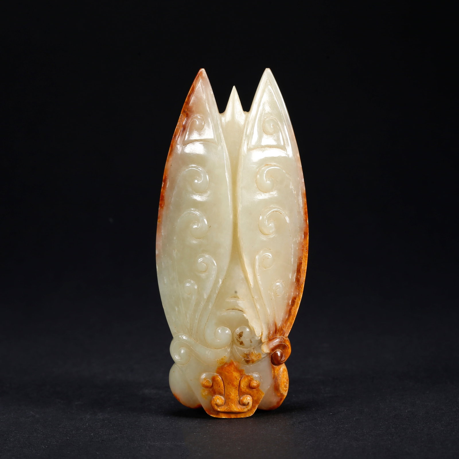 A HETIAN JADE "ASTONISHING TALENT" FIGURINE (1 of 9)