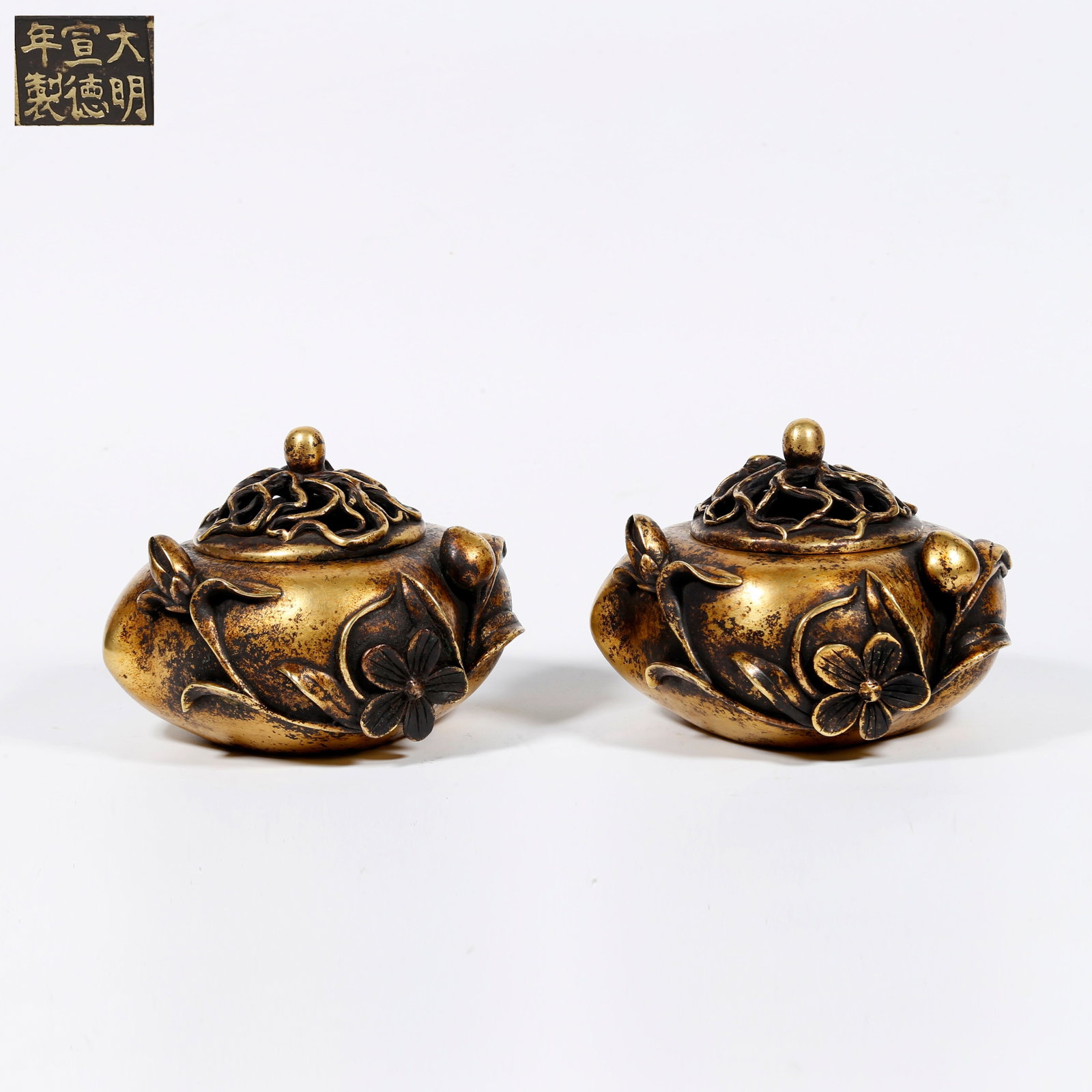 A GILT-BRONZE INCENSE BURNERS WITH LONGEVITY PEACH PATTERN (PAIR) (1 of 8)