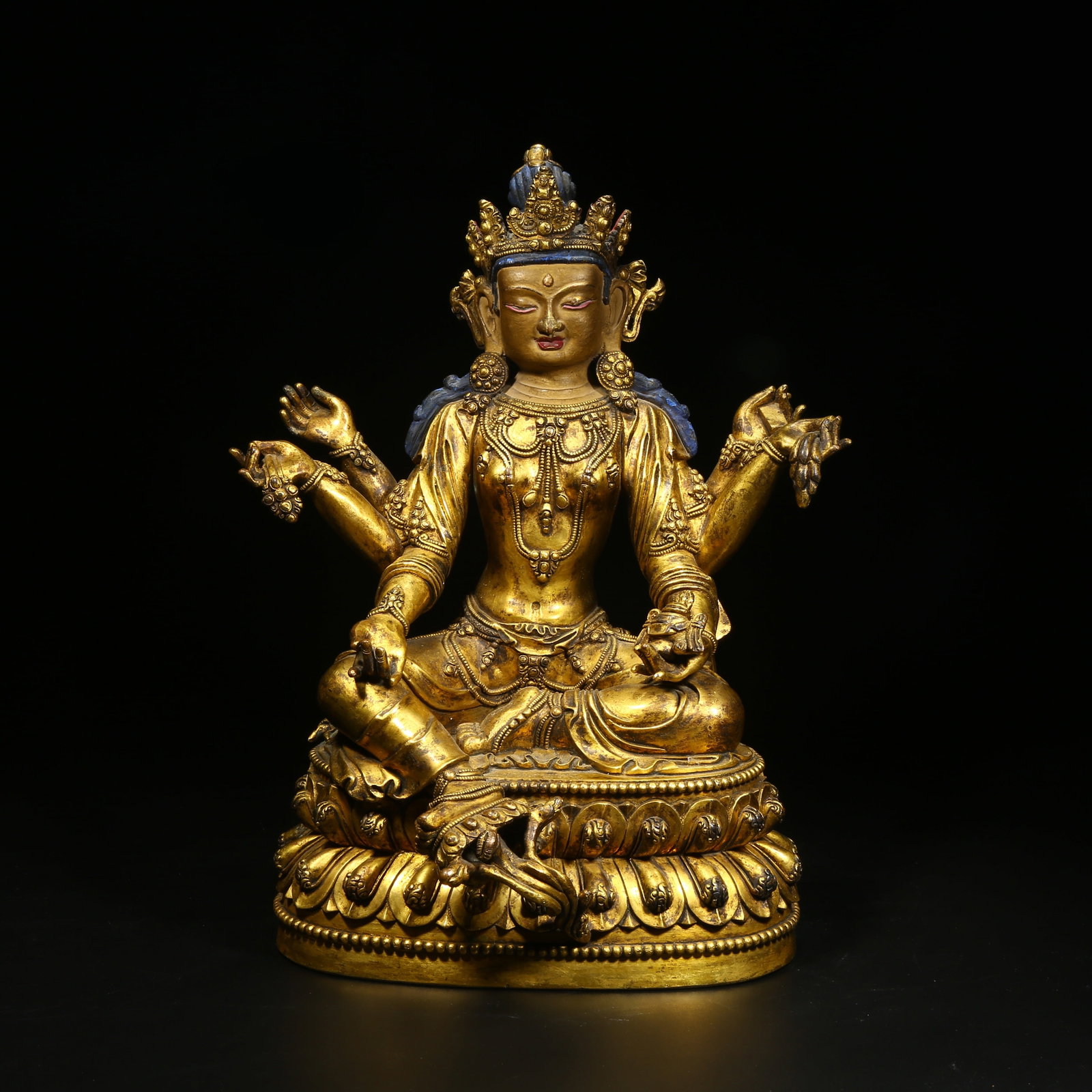 A GILT BRONZE STATUE OF VASUDHARA (GODDESS OF WEALTH AND PROSPERITY) (1 of 8)