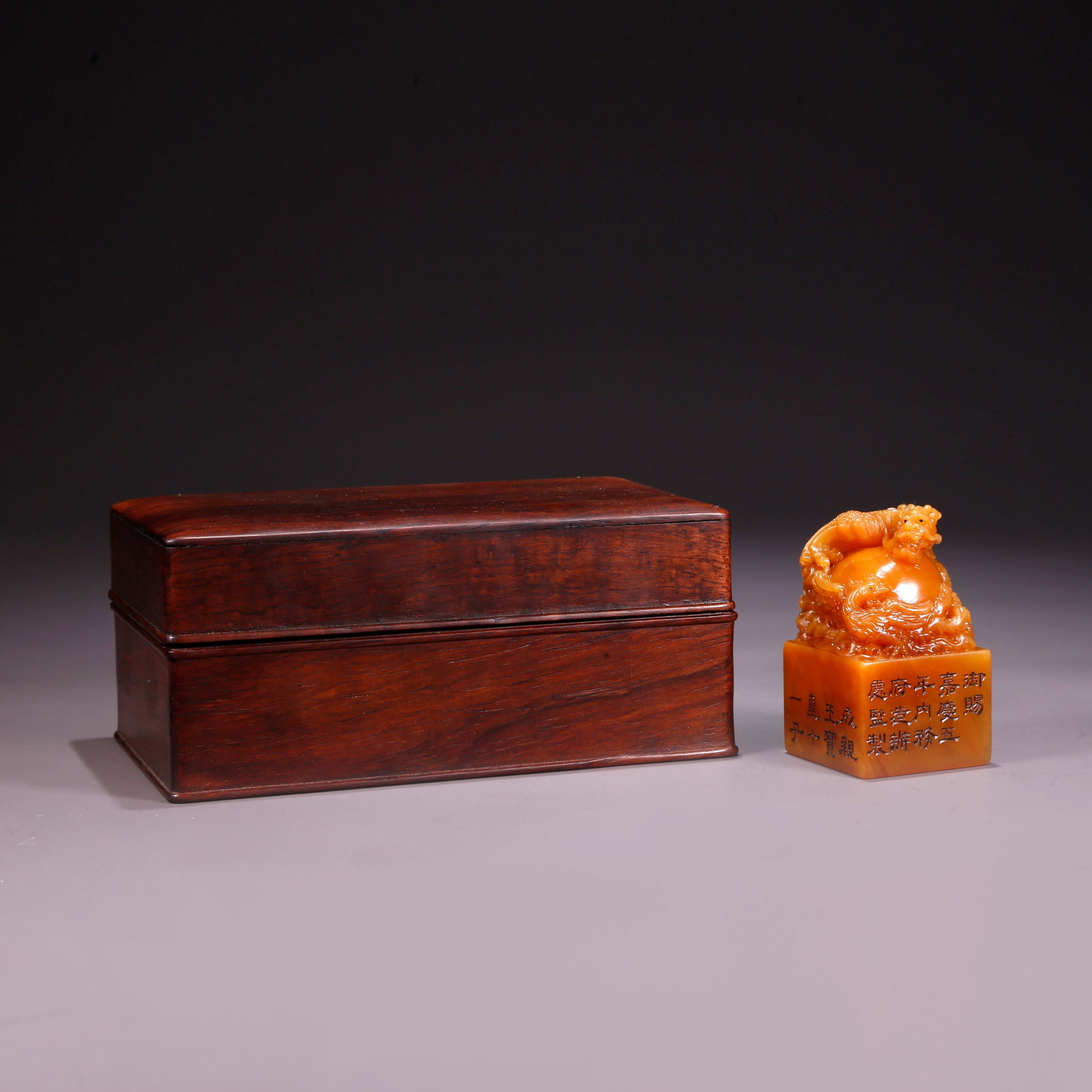 A SHOUSHAN TIANHUANG STONE DRAGON-AND-PHOENIX-HEAD SEAL: Shoushan Tianhuang Stone Dragon-and-Phoenix-Head Seal