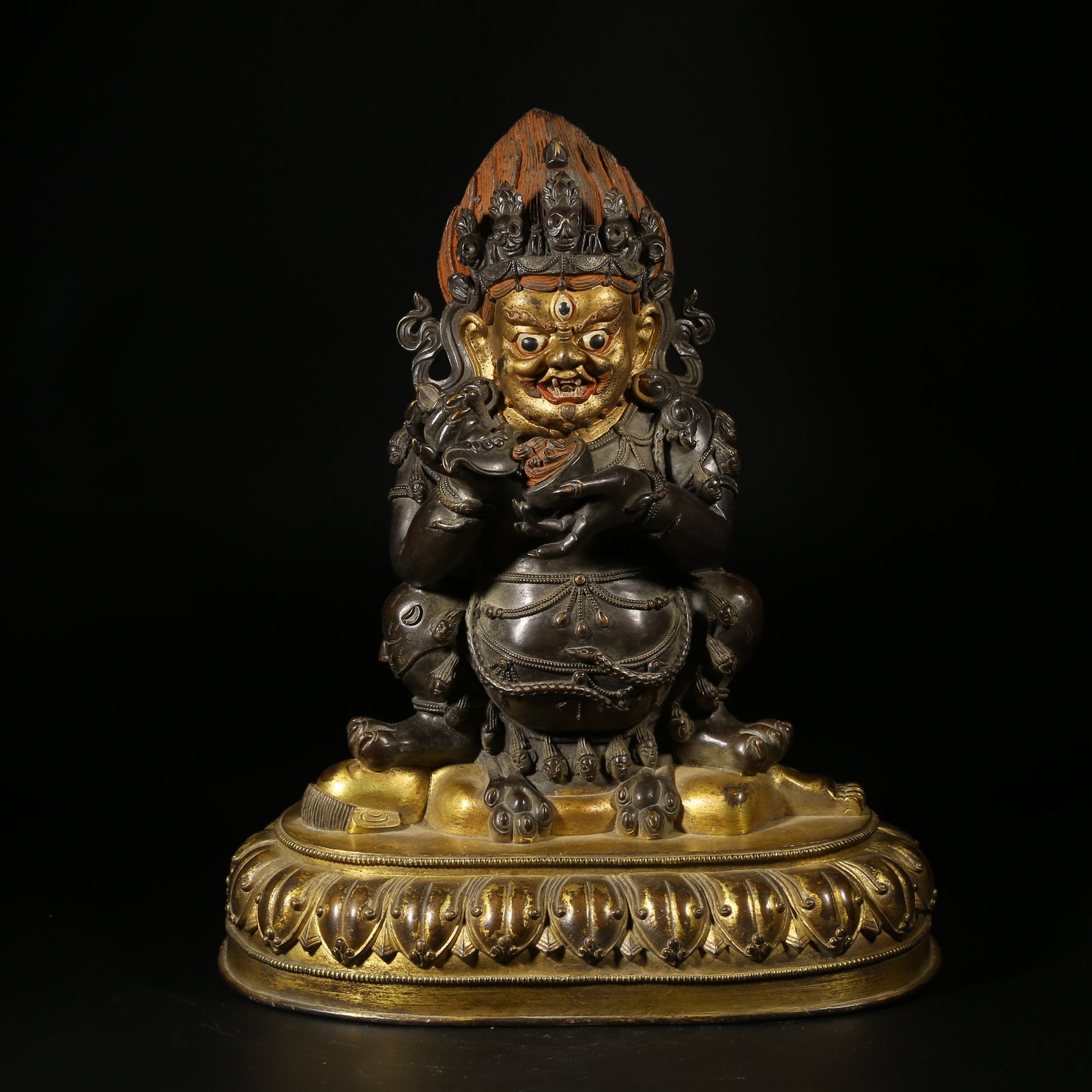 A GILT-BRONZE STATUE OF TWO-ARMED MAH?K?LA: Gilt-Bronze Statue of Two-Armed Mahakala
