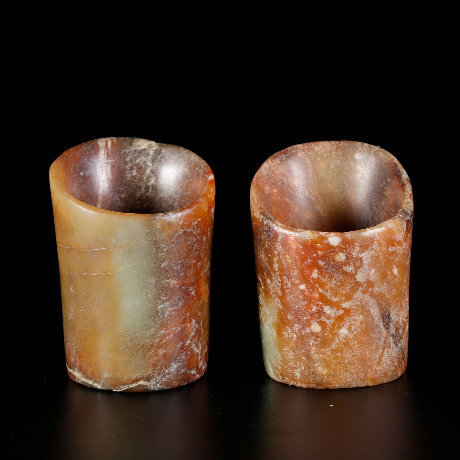 A ARCHAIC JADE CARVED HORSE-HOOF TUBES (PAIR) (1 of 11)