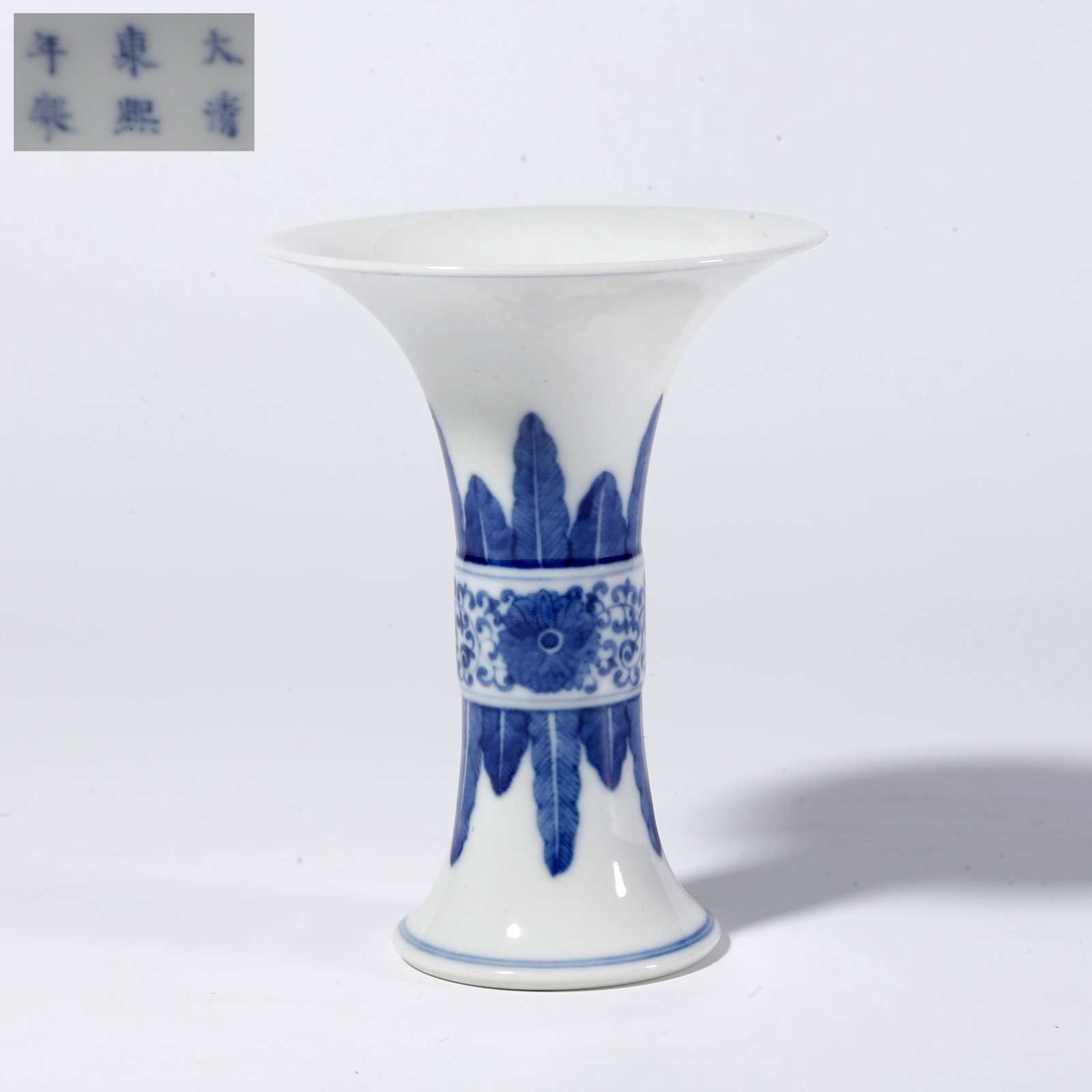 A BLUE-AND-WHITE FLORAL SCROLL PATTERN FLOWER GU: Blue-and-White Floral Scroll Pattern Flower Gu