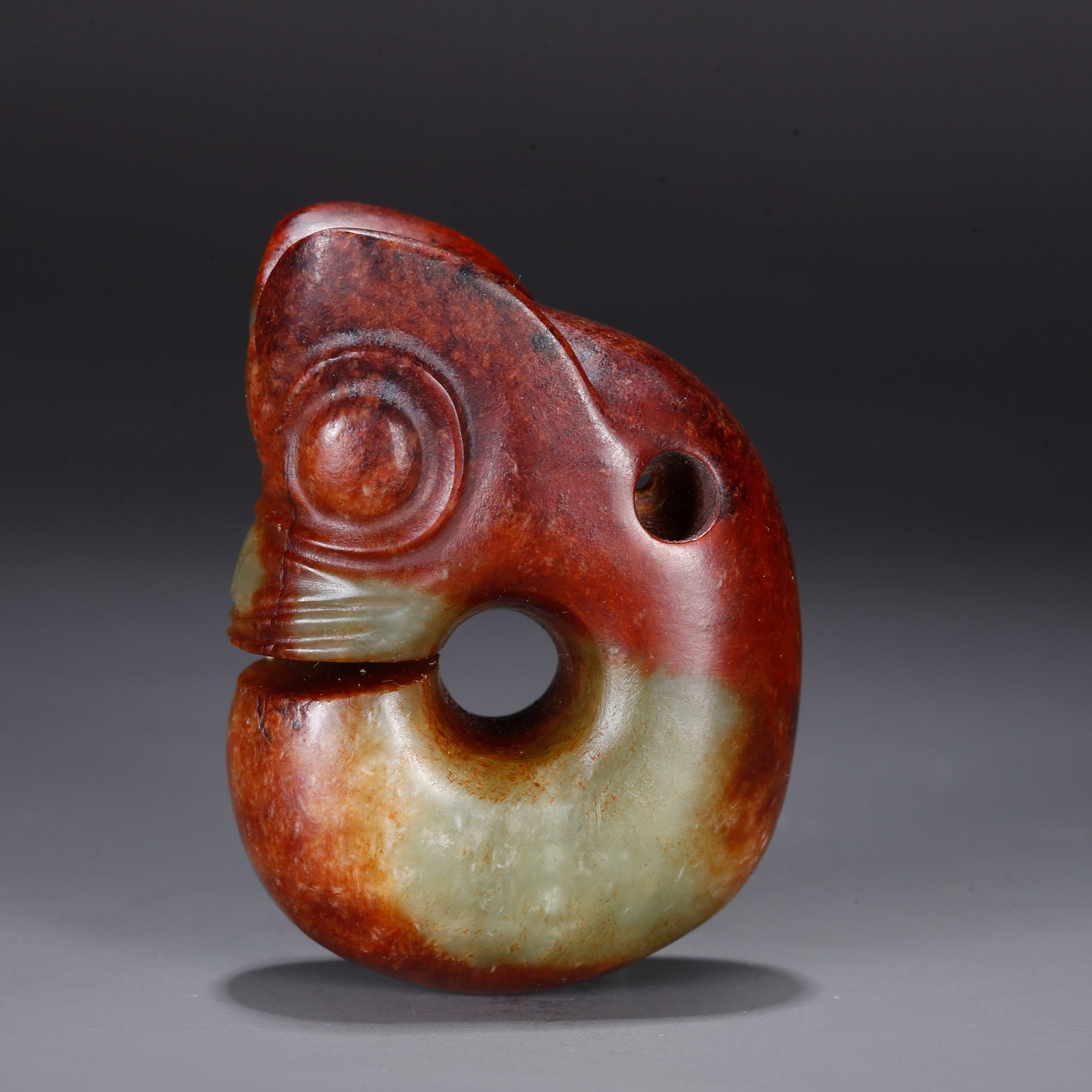 A CARVED ANCIENT JADE PIG DRAGON (1 of 9)