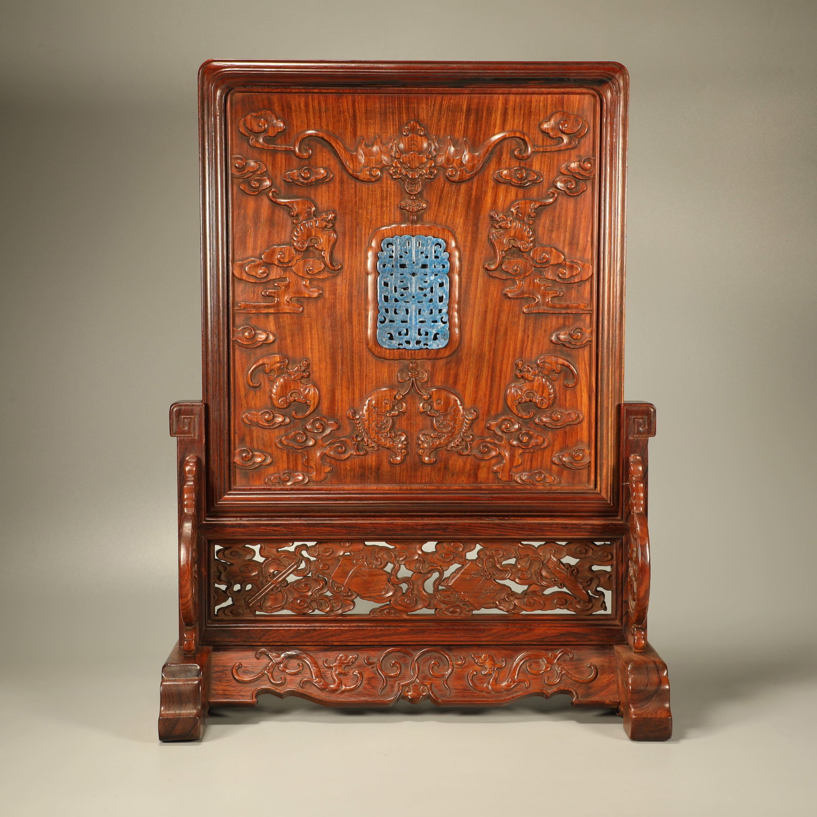 A HUANGHUALI TABLE SCREEN CARVED WITH FIVE BLESSINGS EMBRACING LONGEVITY AND INLAID WITH LAPIS: Huanghuali Table Screen Carved with Five Blessings Embracing Longevity and Inlaid with Lapis Lazuli