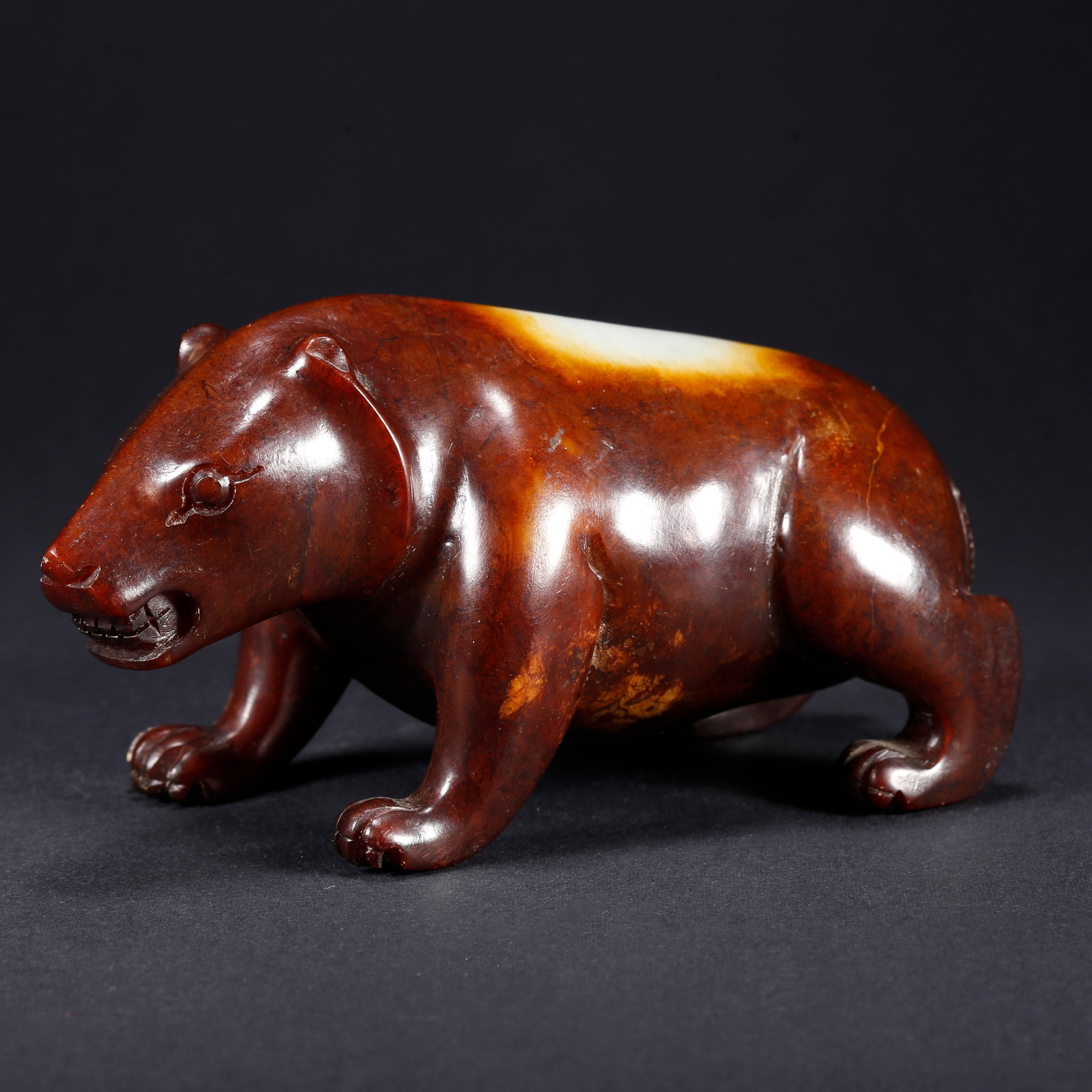 A HETIAN JADE BEAR-SHAPED FIGURINE (1 of 8)