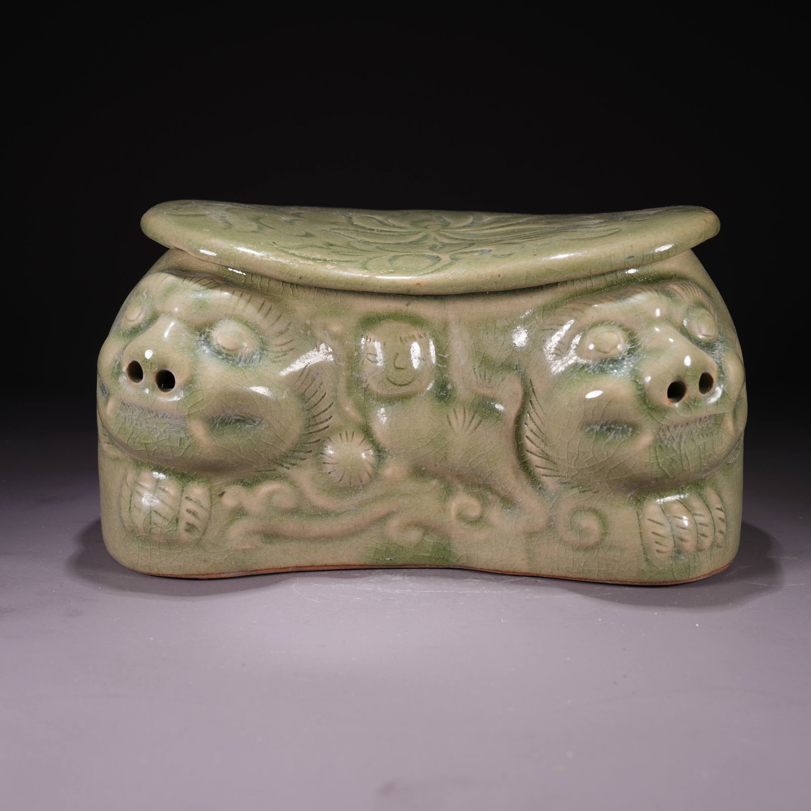 A YAOZHOU WARE PILLOW WITH FLORAL MOTIF: Yaozhou Ware Pillow with Floral Motif