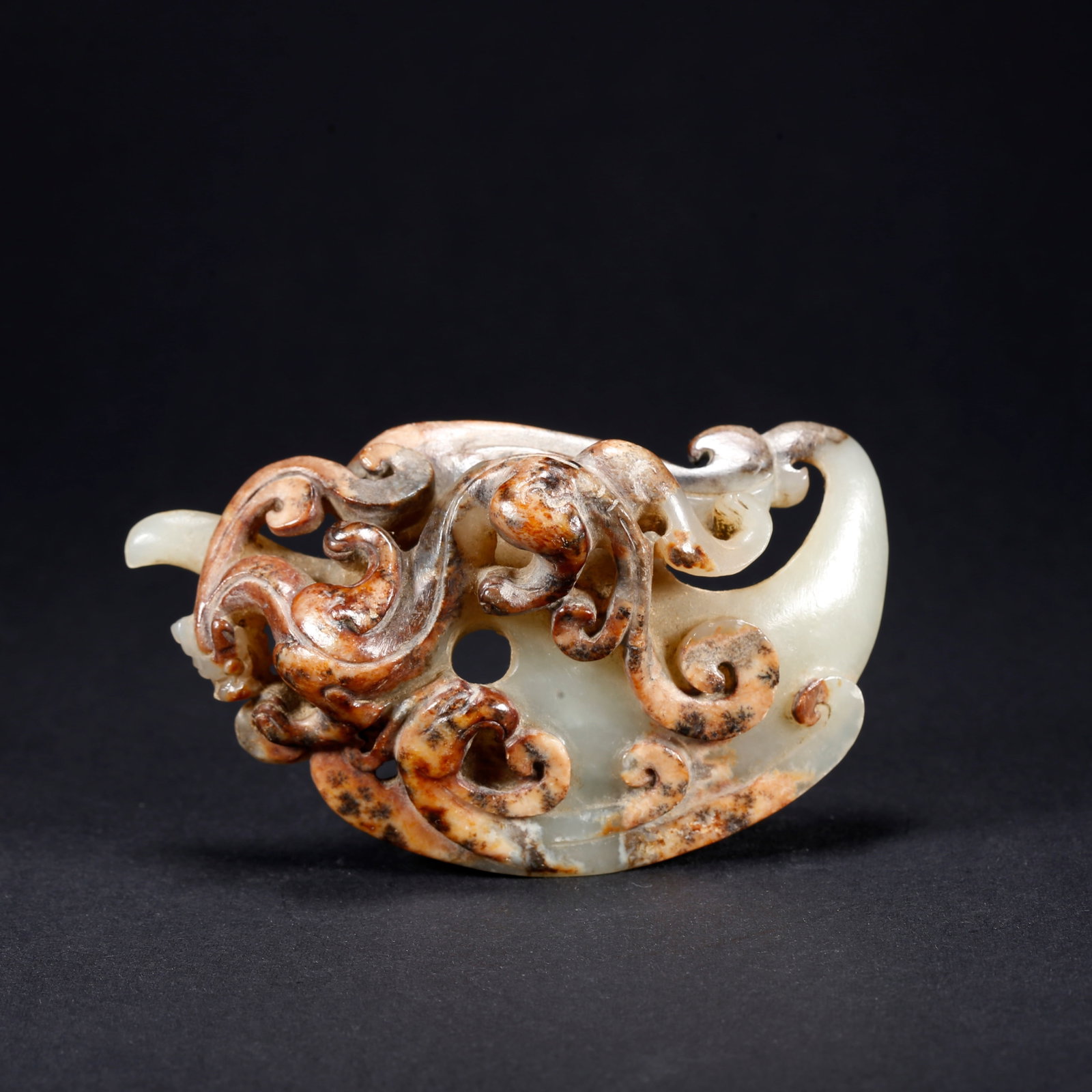 A HETIAN JADE DRAGON AND PHOENIX CHICKEN-HEART PENDANT: Hetian Jade Dragon and Phoenix Chicken-Heart Pendant