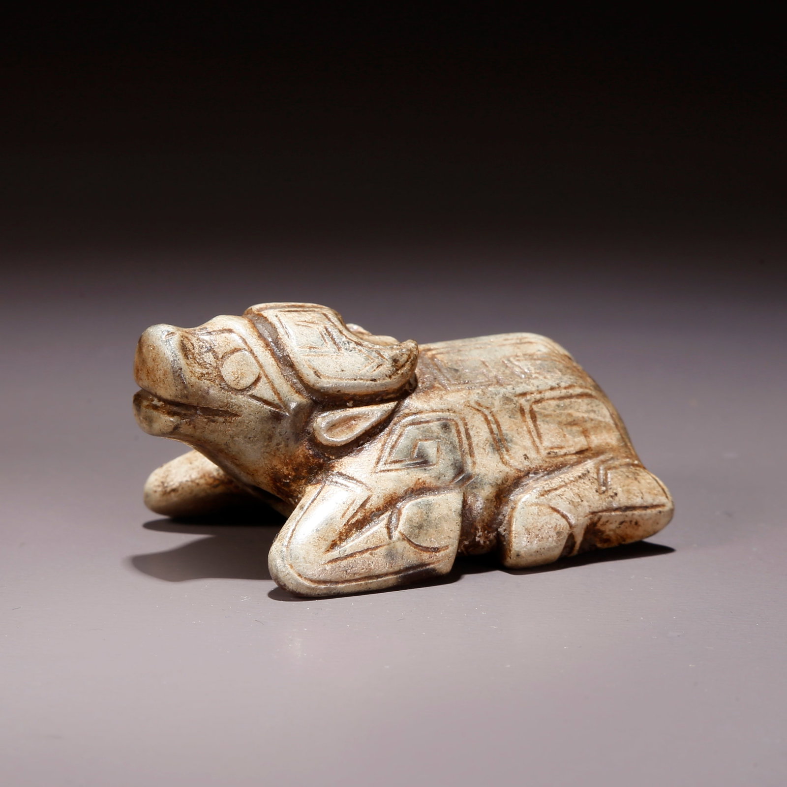 A ANCIENT JADE CARVED OX FIGURINE (1 of 7)