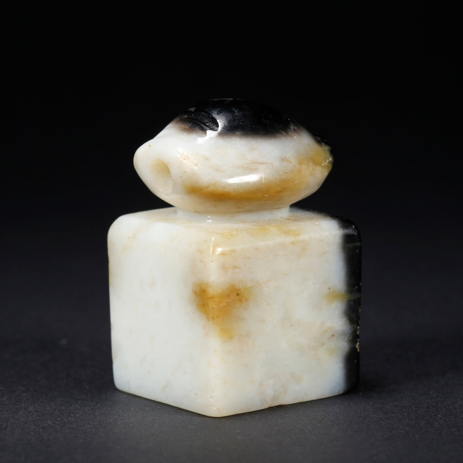 A HETIAN JADE PAPERWEIGHT (1 of 9)