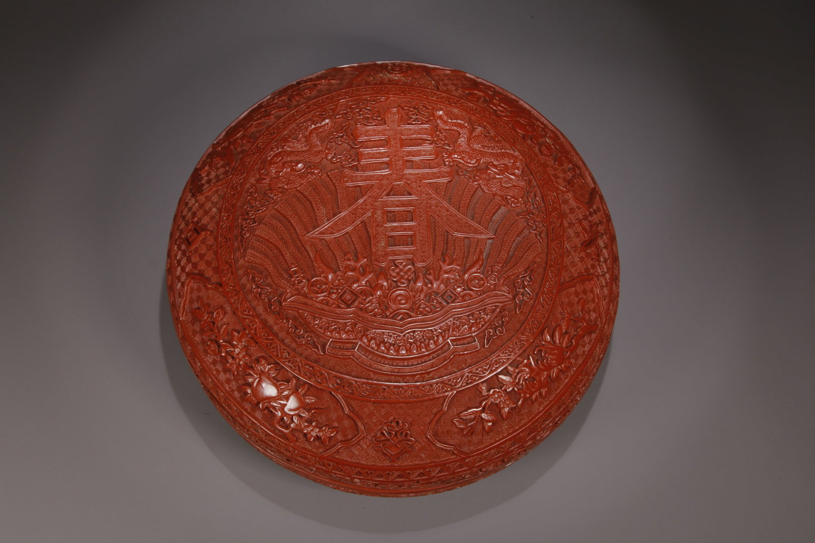 A CARVED RED LACQUER COVERED BOX WITH SPRING CHARACTER PATTERN - 8