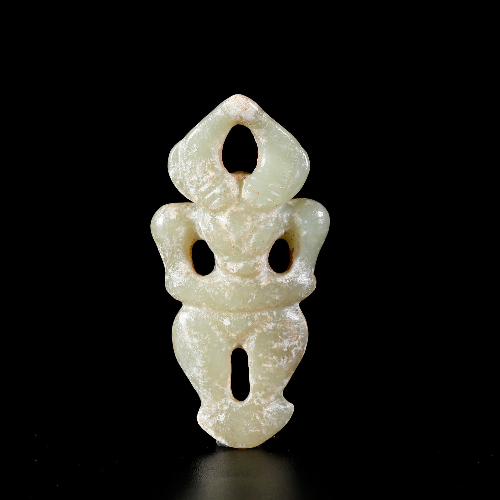 A ARCHAIC JADE CARVED SUN DEITY ORNAMENT (1 of 9)