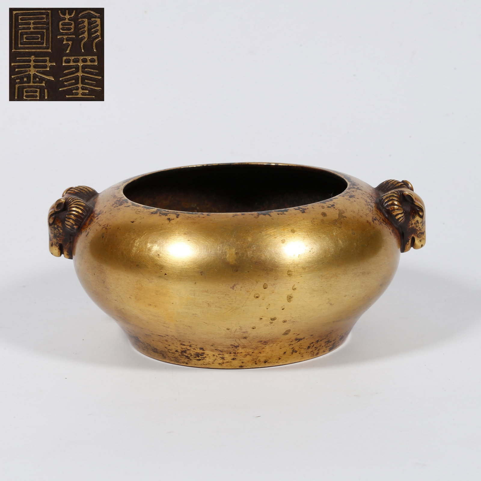A GILT-BRONZE CENSER WITH DOUBLE RAM HANDLES (1 of 9)