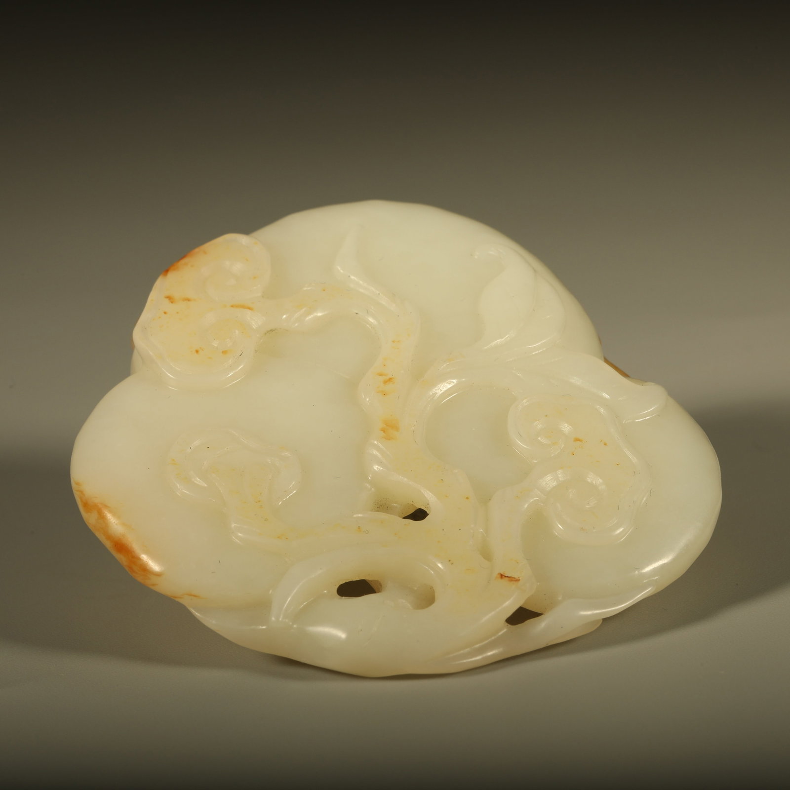 A HETIAN JADE PENDANT CARVED WITH SATISFYING WISHES PATTERN (1 of 7)