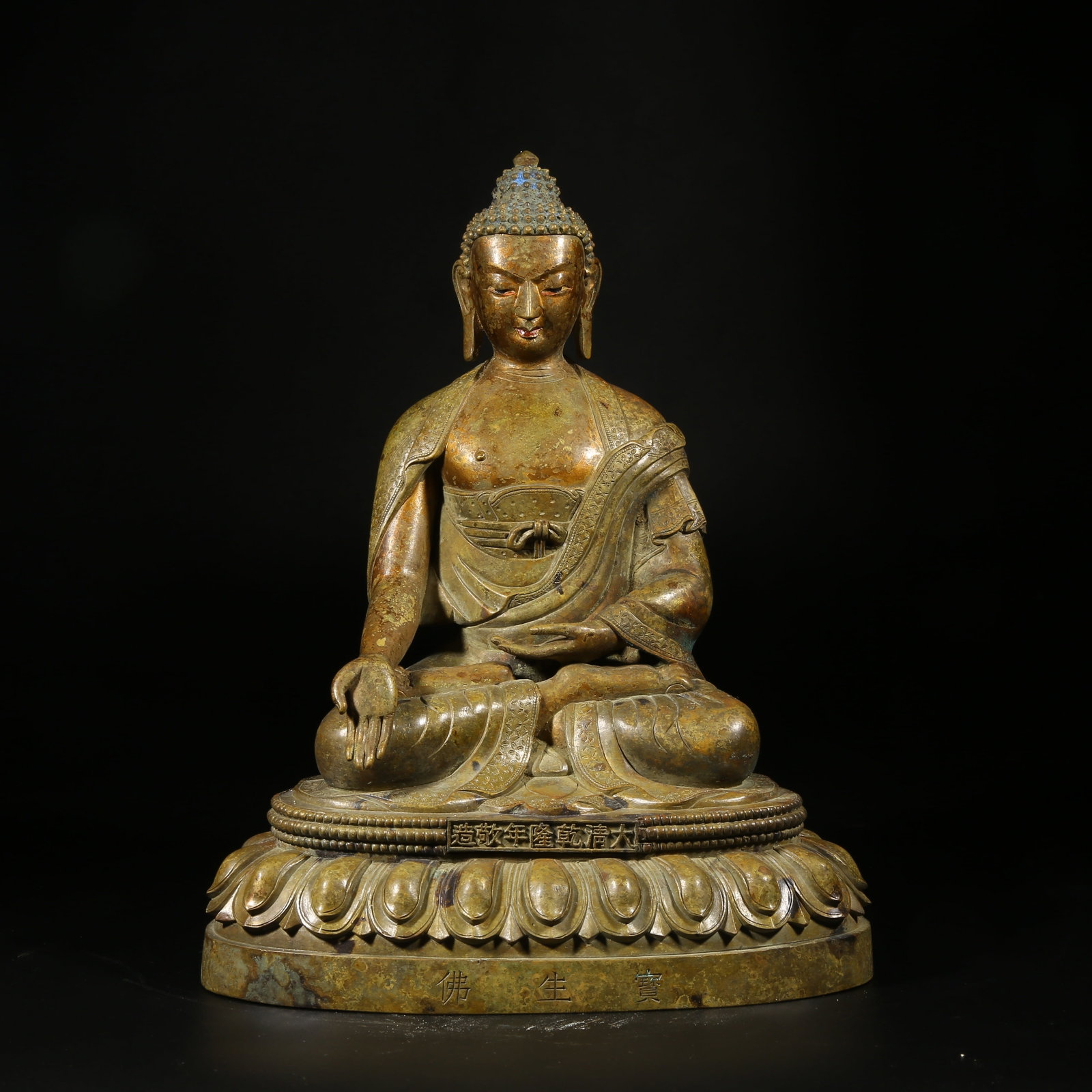 A BRONZE STATUE OF RATNASAMBHAVA BUDDHA: Bronze Statue of Ratnasambhava Buddha