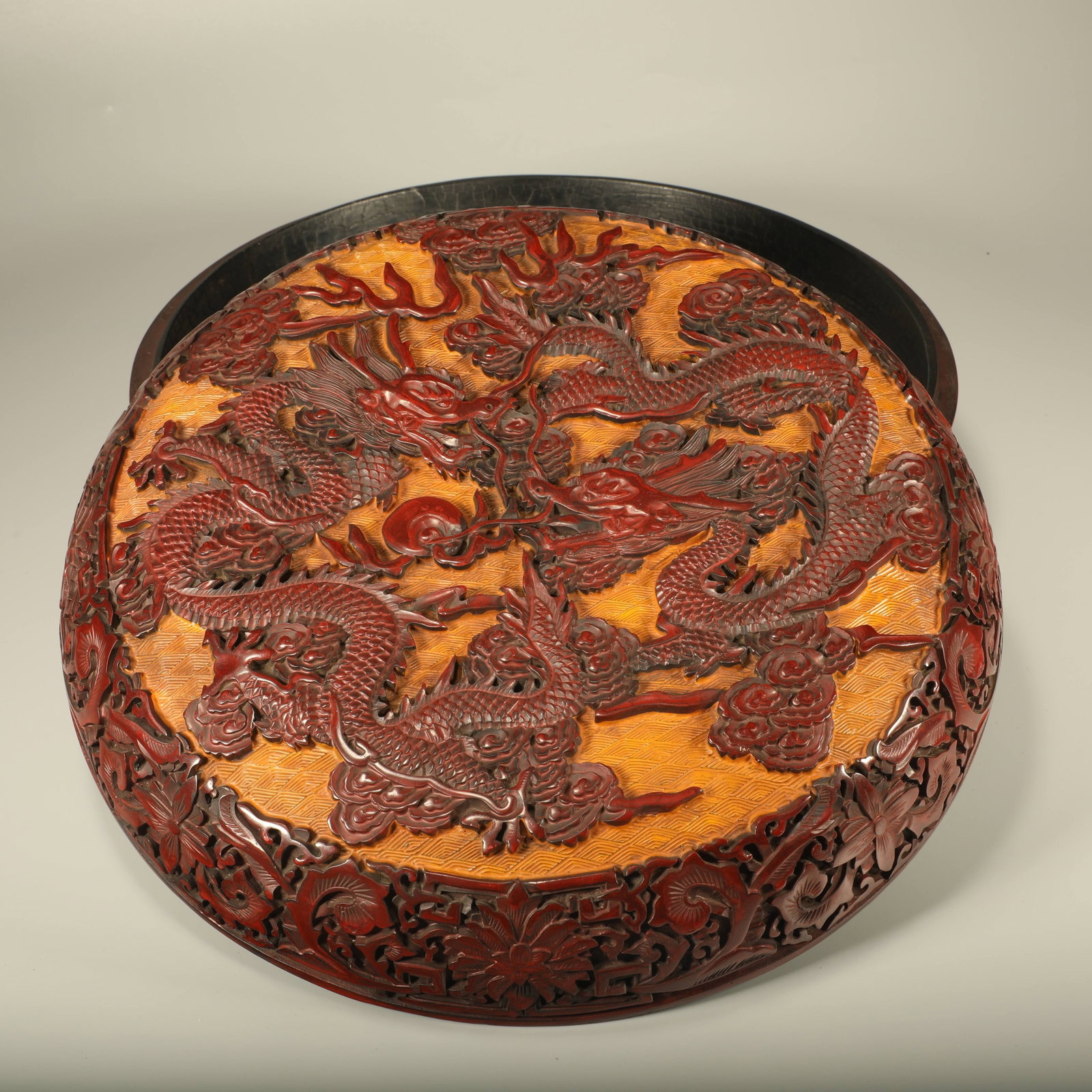 A LACQUERED HAND BOX CARVED WITH DOUBLE DRAGONS PLAYING PEARL (1 of 6)