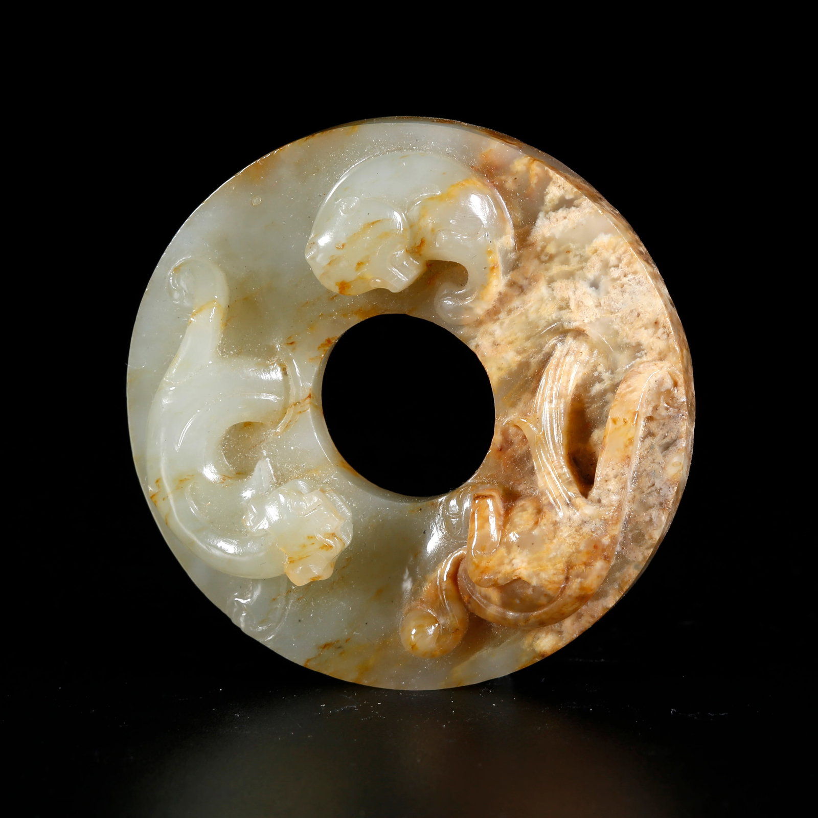 A HETIAN JADE CARVED ANIMAL-MOTIF BI DISC: Hetian Jade Carved Animal-Motif Bi Disc