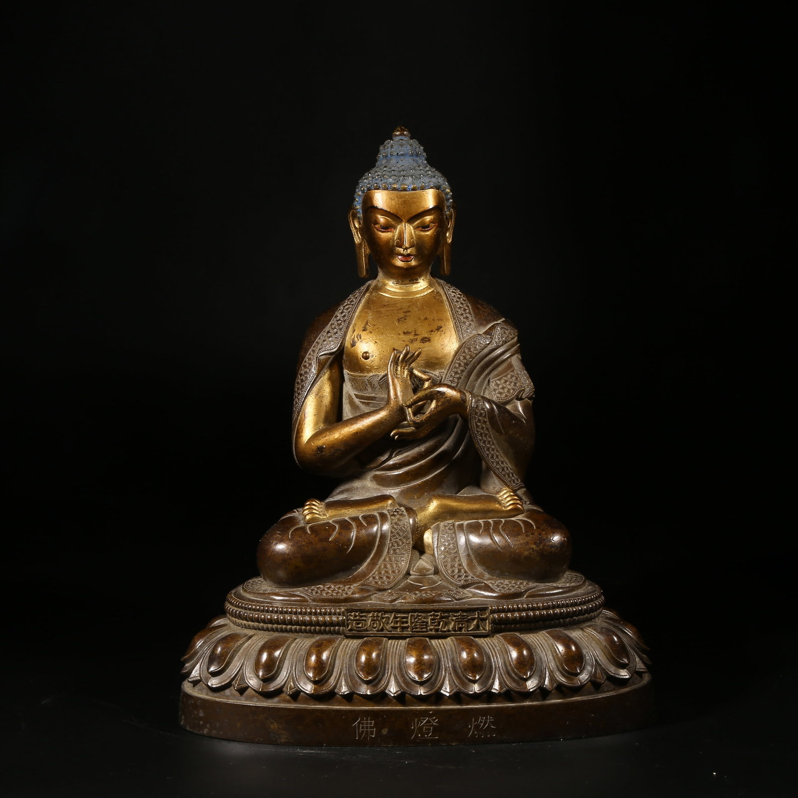 A BRONZE MUD-GILDED STATUE OF DIPANKARA BUDDHA (1 of 8)