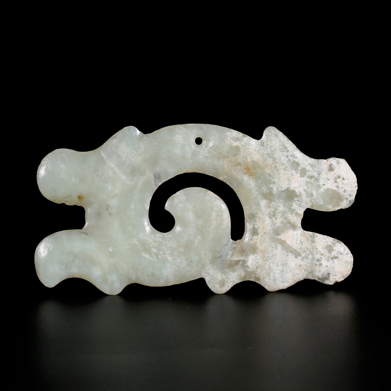 A ARCHAIC JADE CARVED CLOUD-SHAPED PENDANT (1 of 10)