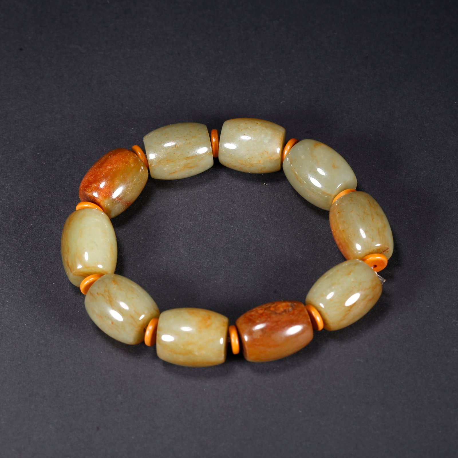 A HETIAN YELLOW JADE BEADED BRACELET: Hetian Yellow Jade Beaded Bracelet