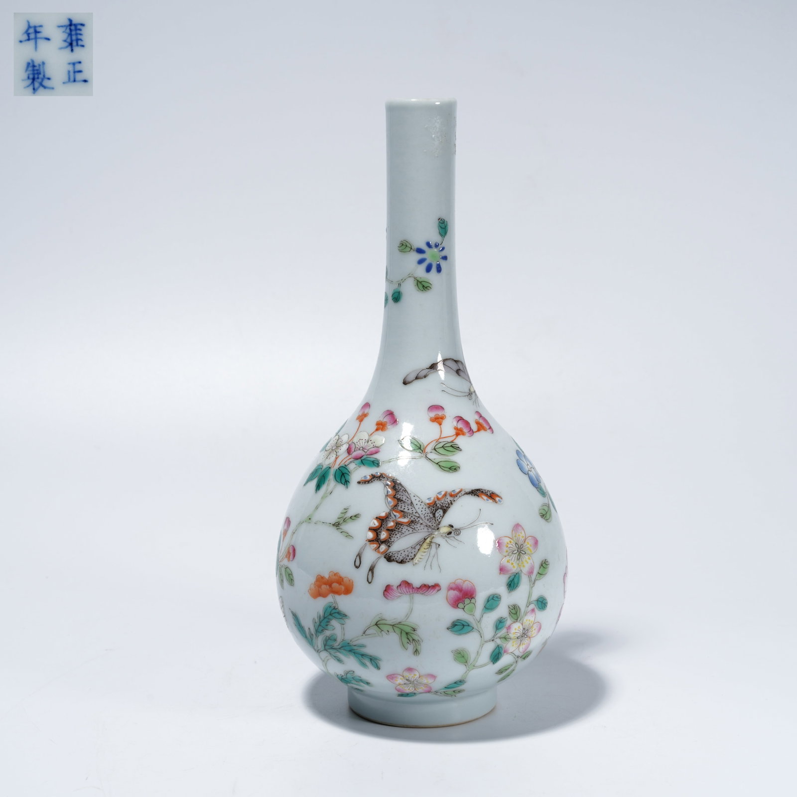 A FAMILLE-ROSE APPRECIATION VASE WITH FLOWER-AND-BUTTERFLY MOTIF: Famille-Rose Appreciation Vase with Flower-and-Butterfly Motif