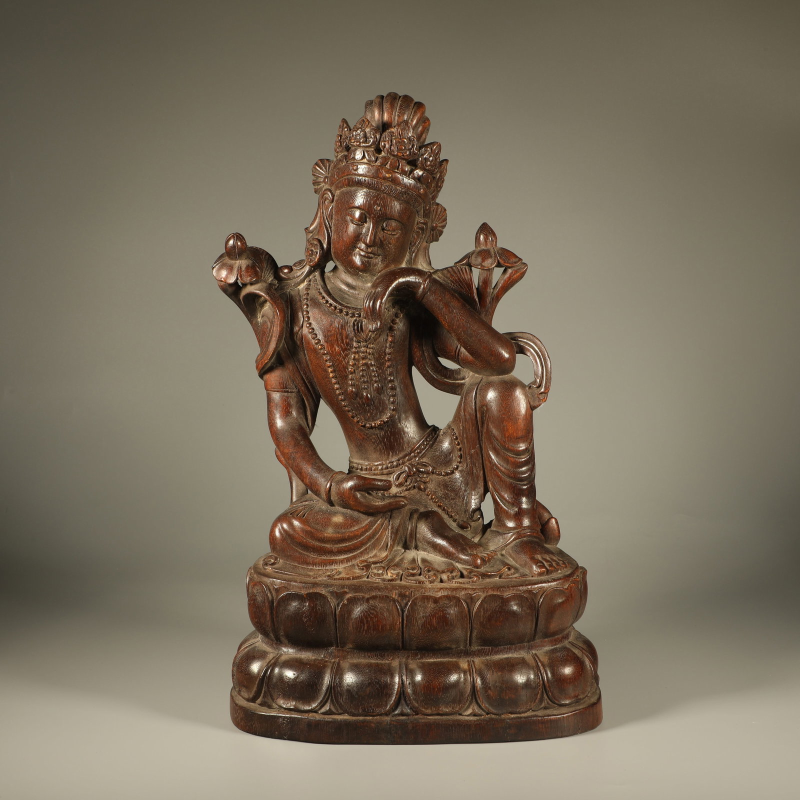 A AGARWOOD CARVED WHITE TARA STATUE: Agarwood Carved White Tara Statue