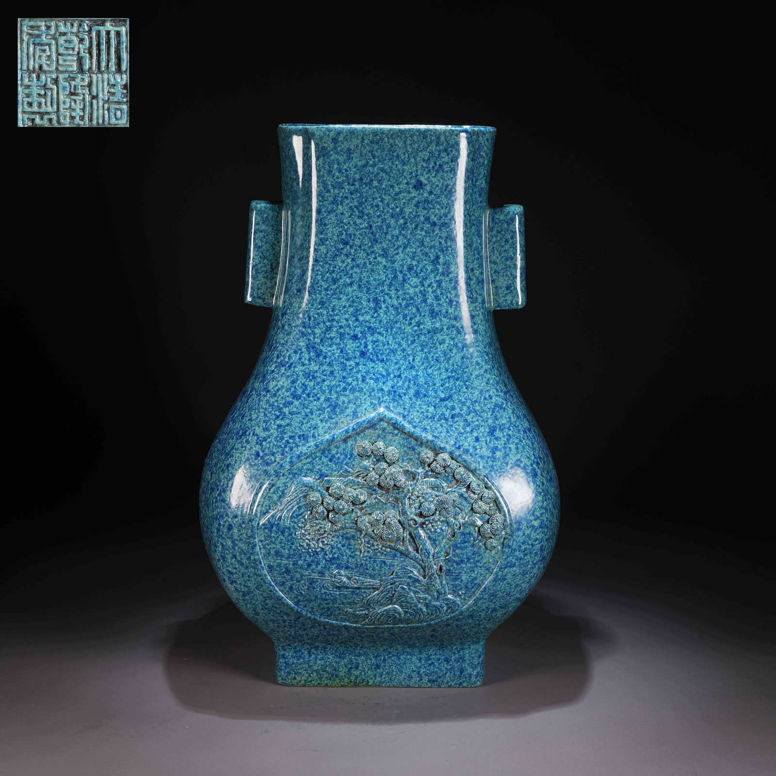 A JUN-TYPE GLAZED CARVED PORCELAIN VASE WITH LANDSCAPE AND PAVILION MOTIFS AND LUG HANDLES: Jun-Type Glazed Carved Porcelain Vase with Landscape and Pavilion Motifs and Lug Handles