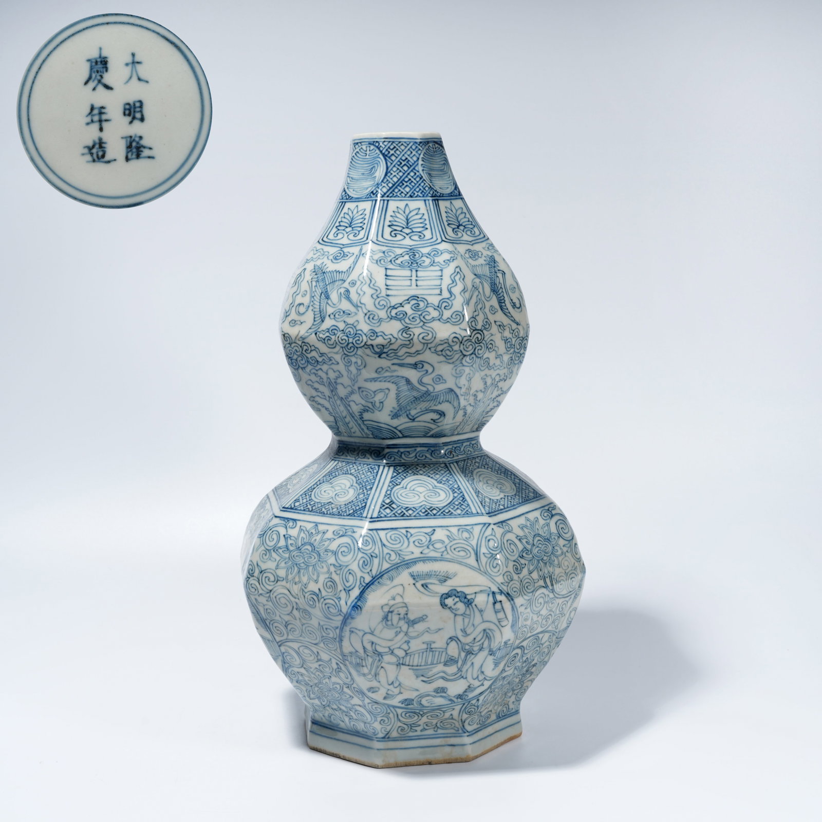 A BLUE-AND-WHITE GOURD-FORM VASE WITH FIGURAL NARRATIVE MOTIF (1 of 10)