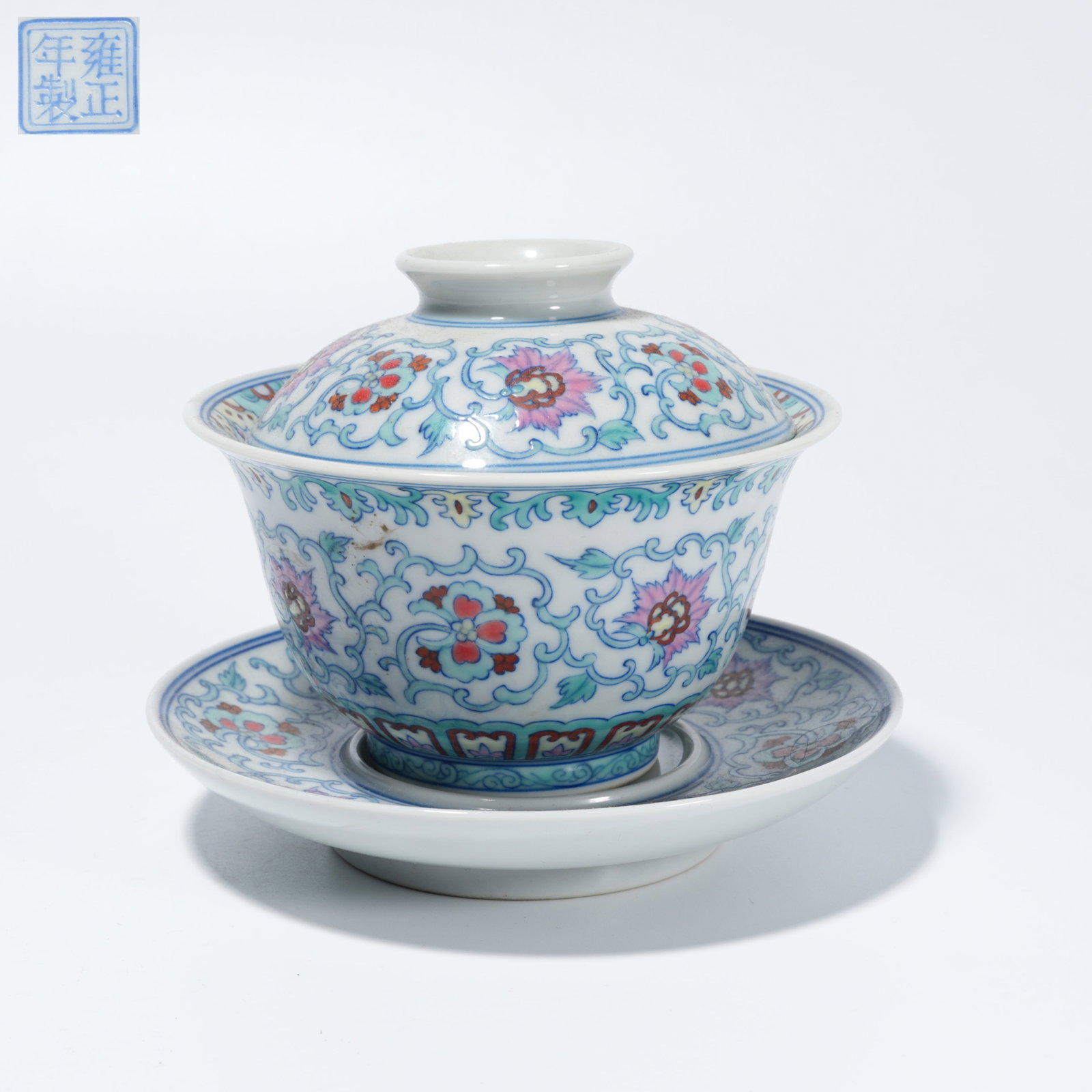 A DOUCAI TEA BOWL WITH LIAN-ZHI FLOWER MOTIF: Doucai Tea Bowl with Lian-Zhi Flower Motif