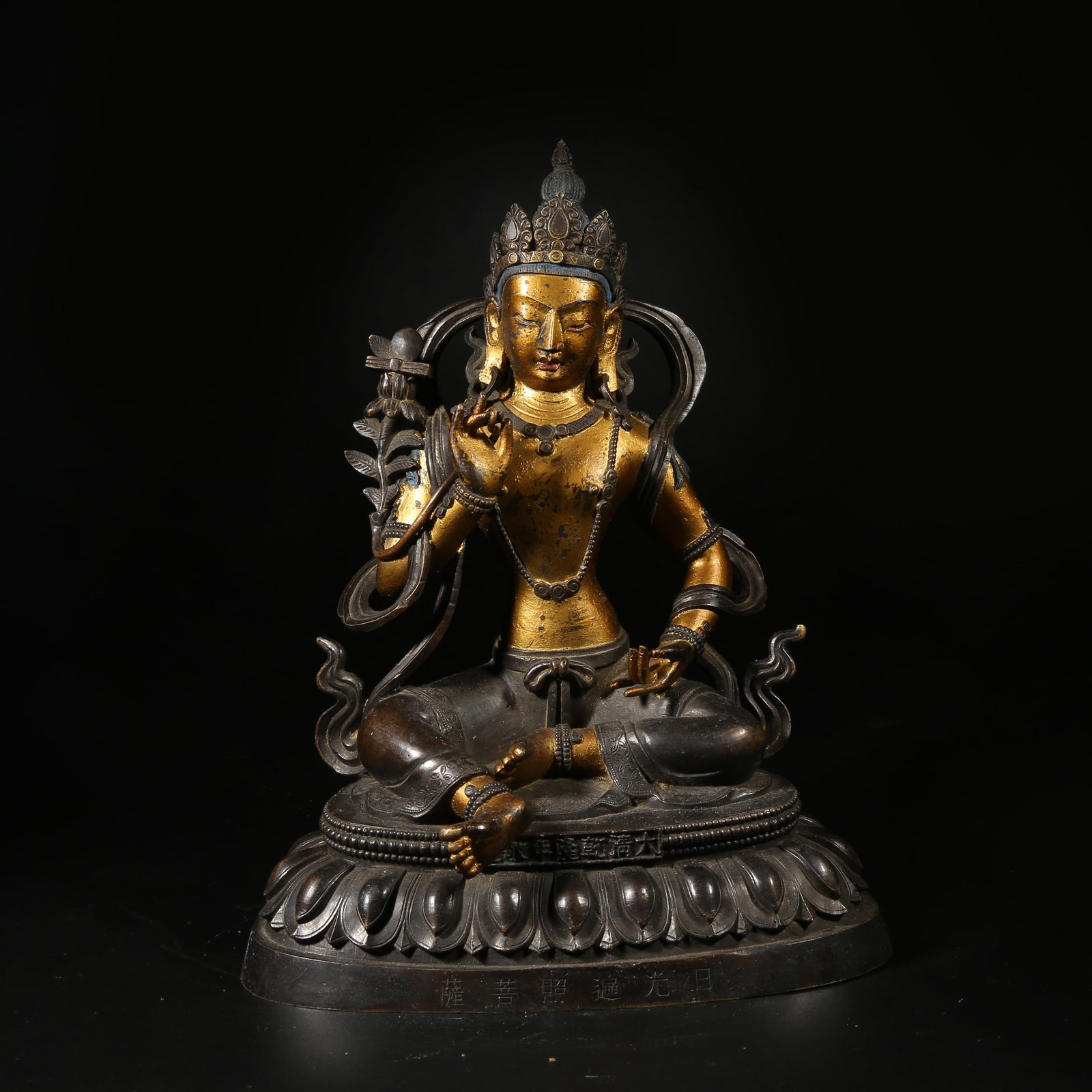 A BRONZE MUD-GILDED STATUE OF SURYA BODHISATTVA: Bronze Mud-Gilded Statue of Surya Bodhisattva