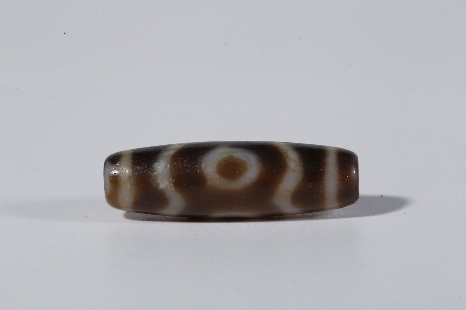 A THREE-EYED DZI BEAD - 4