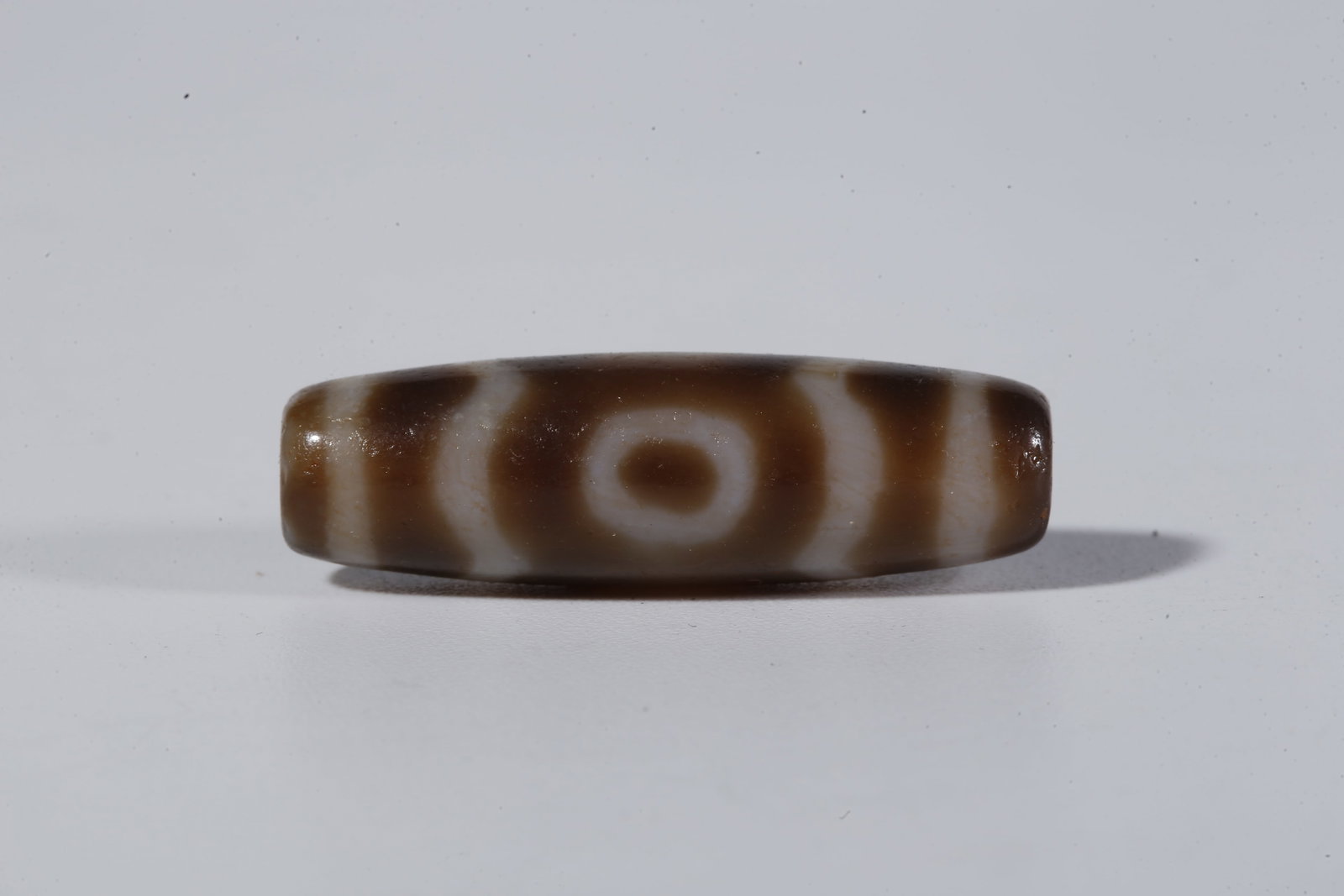 A THREE-EYED DZI BEAD - 5