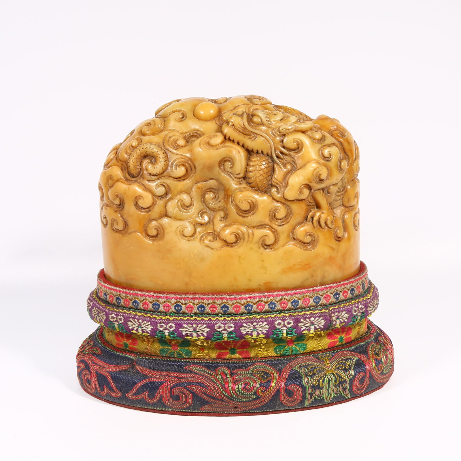 A SHOUSHAN STONE SEAL WITH CLOUD-AND-DRAGON DESIGN: Shoushan stone seal with cloud-and-dragon design