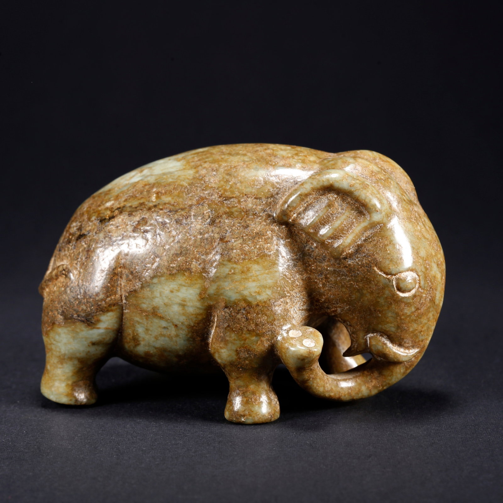 A HETIAN JADE RUYI WITH "PEACE AND PROSPERITY" ELEPHANT MOTIF (1 of 9)