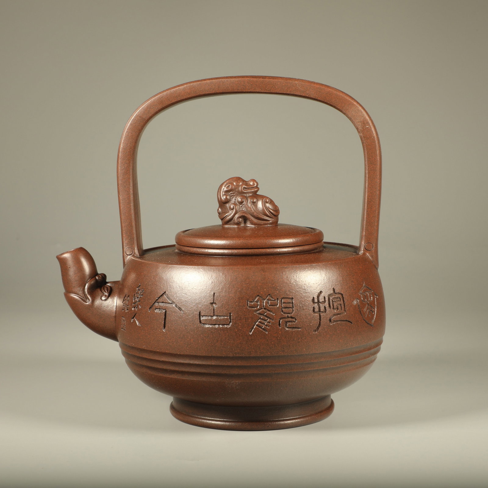 A PURPLE CLAY DRAGON SPOUT HANDLED POT (1 of 6)