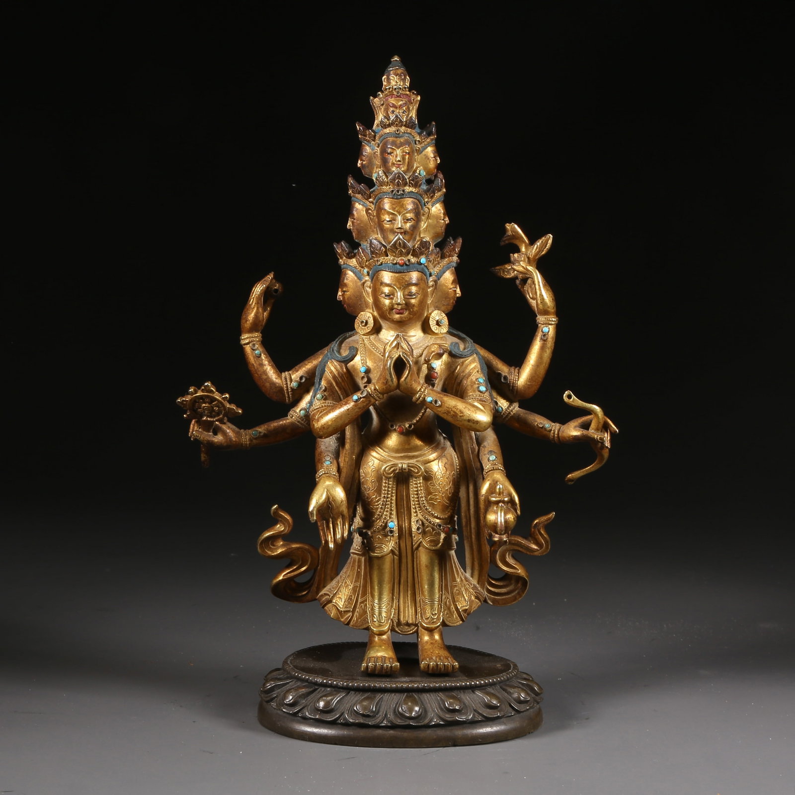 A GILT-BRONZE STATUE OF THE ELEVEN-HEADED AVALOKITE?VARA (1 of 8)