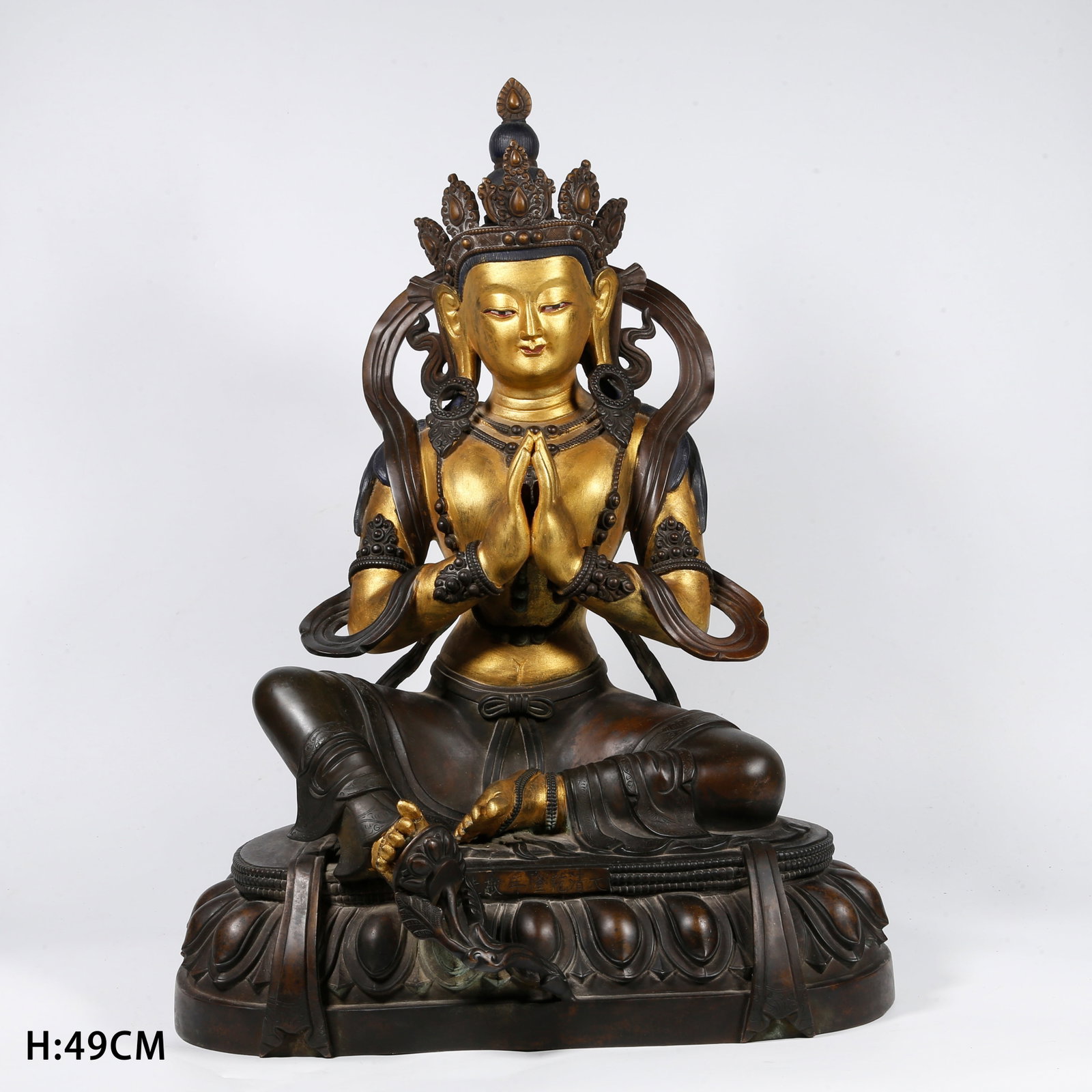 A GILT-BRONZE TARA STATUE (PARTIALLY GILDED): Gilt-bronze Tara statue (partially gilded)