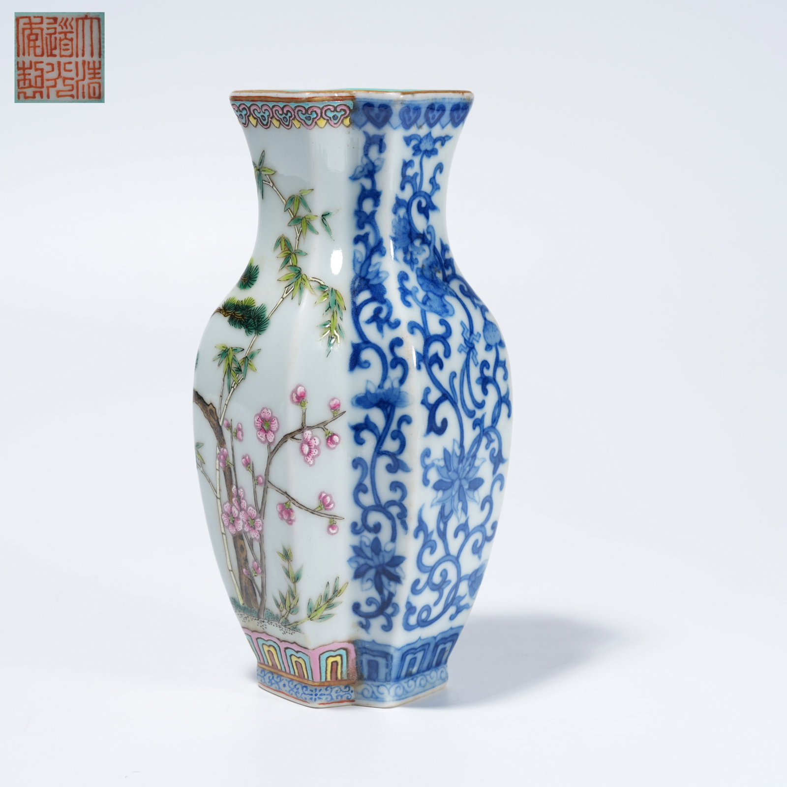 A BLUE-AND-WHITE AND FAMILLE-ROSE PAIRED VASE: Blue-and-White and Famille-Rose Paired Vase