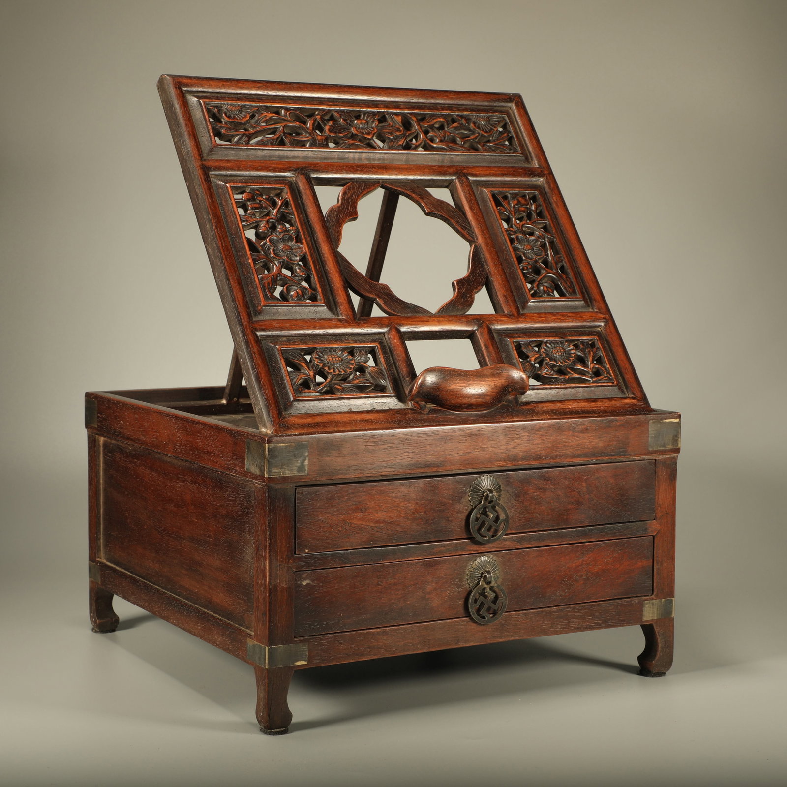 A HUANGHUALI DRESSING TABLE CARVED WITH FLORAL PATTERNS (1 of 6)
