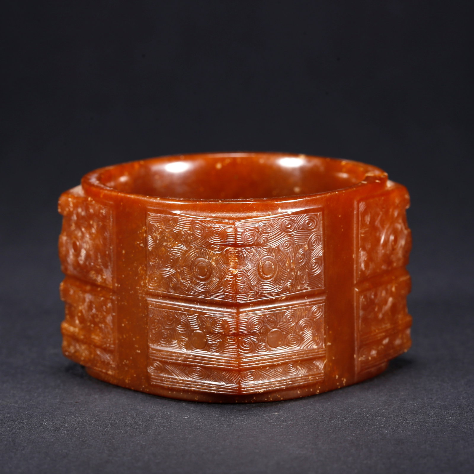 A ANCIENT JADE CONG WITH BEAST FACE MOTIF: Ancient Jade Cong with Beast Face Motif