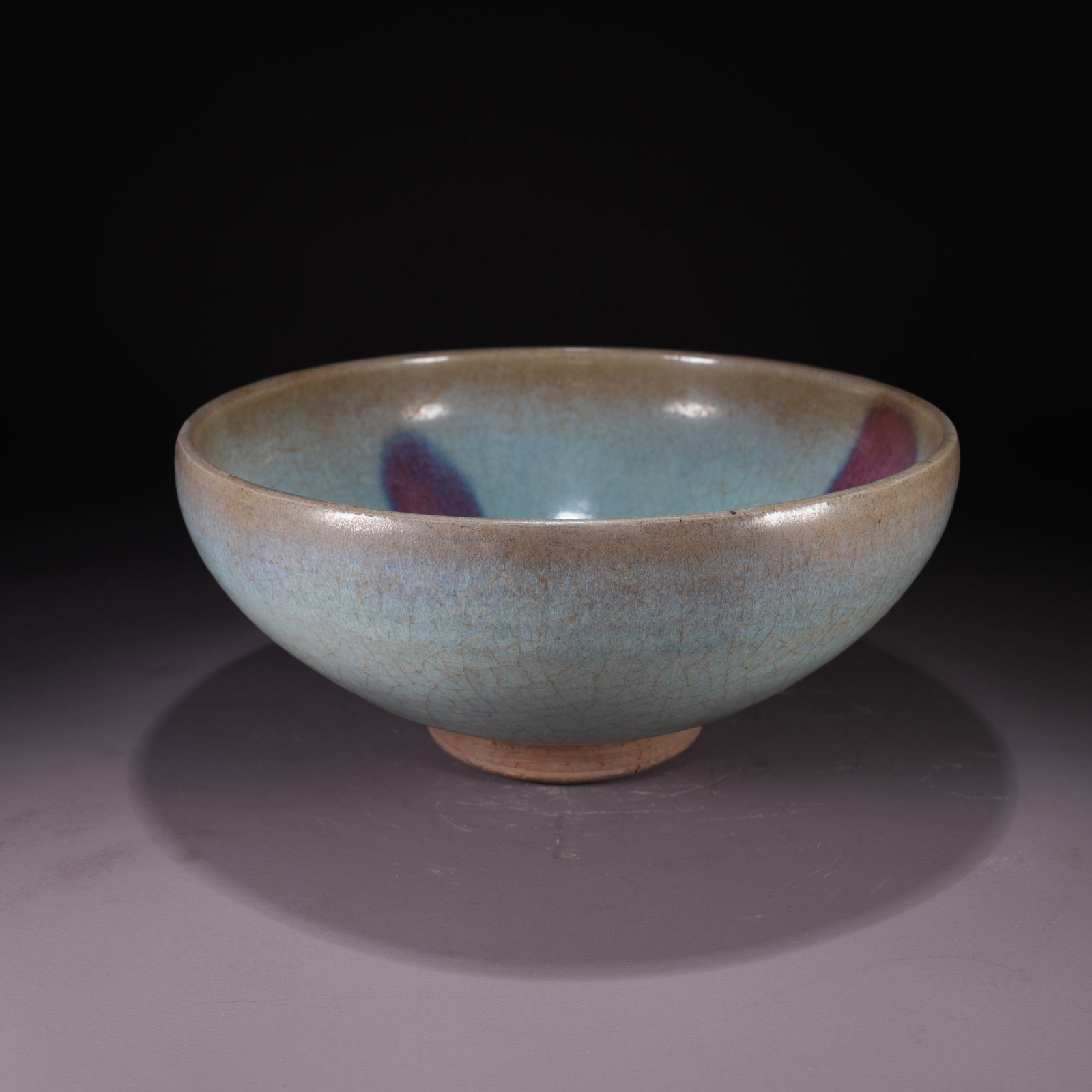 A JUN WARE LARGE BOWL WITH PURPLE SPLASHES: Jun Ware Large Bowl with Purple Splashes