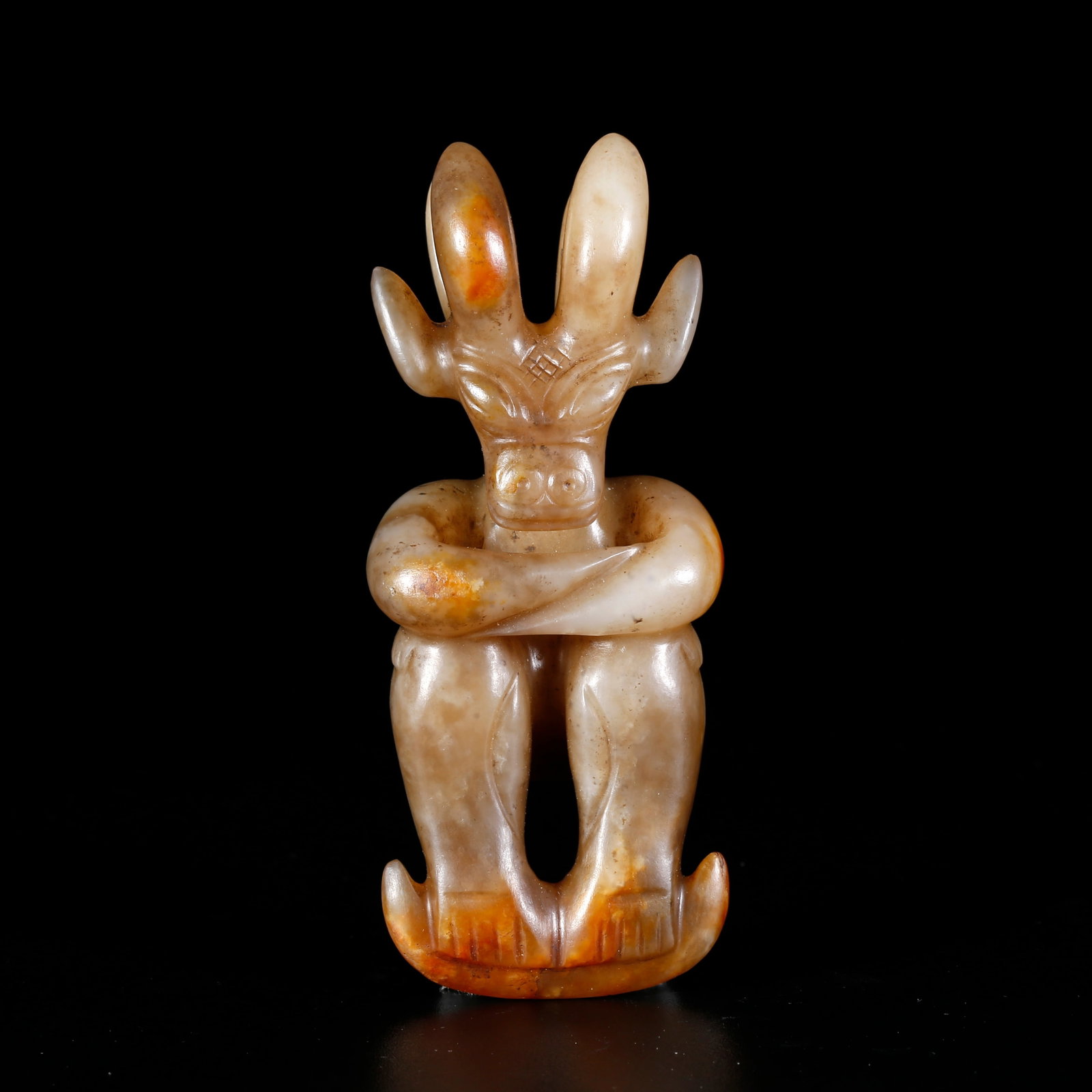 A ARCHAIC JADE CARVED SUN DEITY ORNAMENT: Archaic Jade Carved Sun Deity Ornament