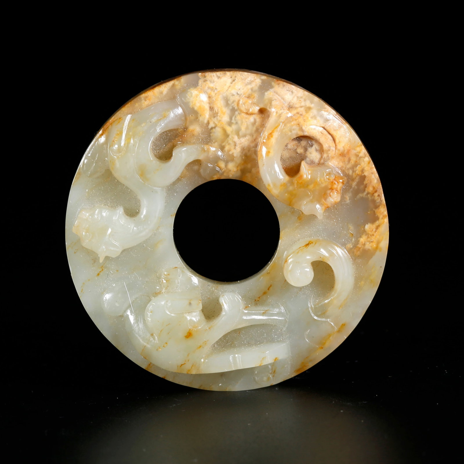 A HETIAN JADE CARVED DRAGON-MOTIF BI DISC (1 of 10)