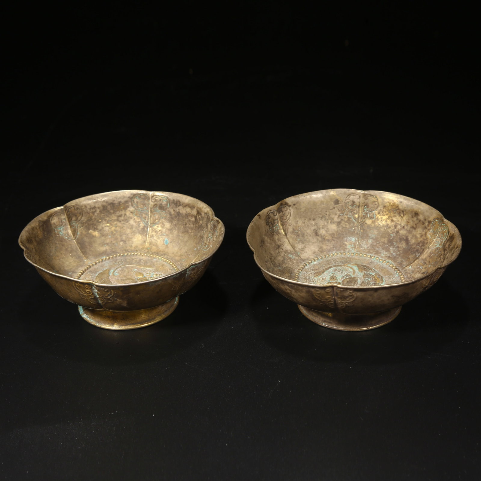 A SET OF SILVER FLOWER-MOUTHED CUPS WITH FLYING CELESTIAL PATTERN (1 of 10)