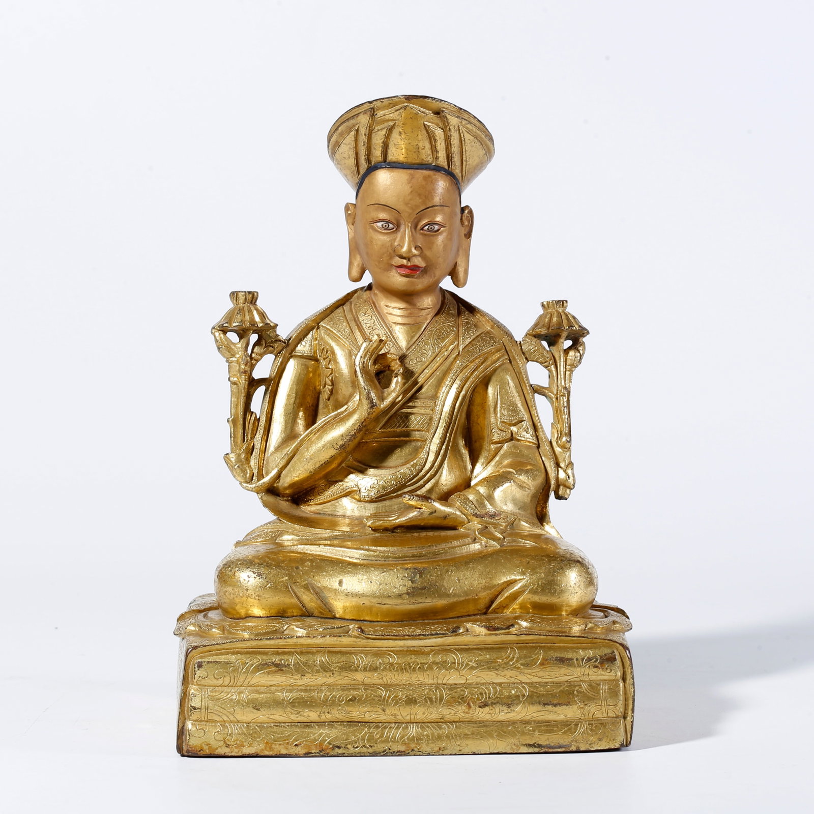 A GILDED BRONZE LAMA STATUE (1 of 9)