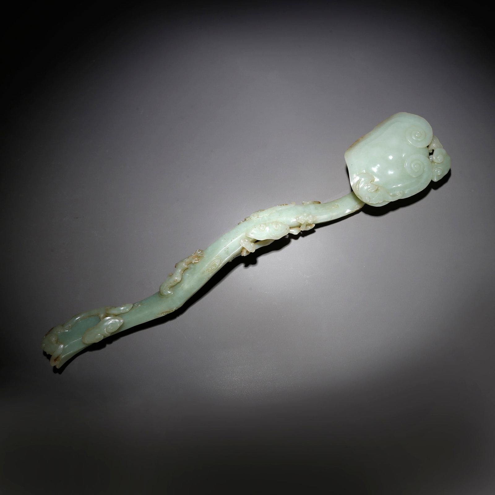 A CARVED HETIAN JADE LINGZHI-SHAPED RUYI (1 of 9)
