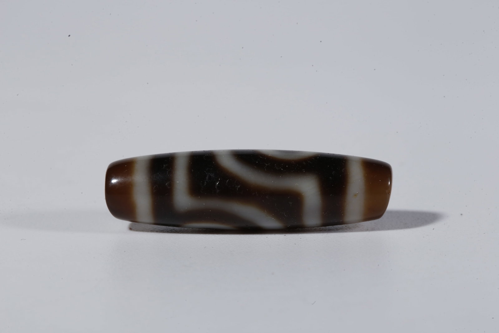 A TWO-EYED DZI BEAD - 3